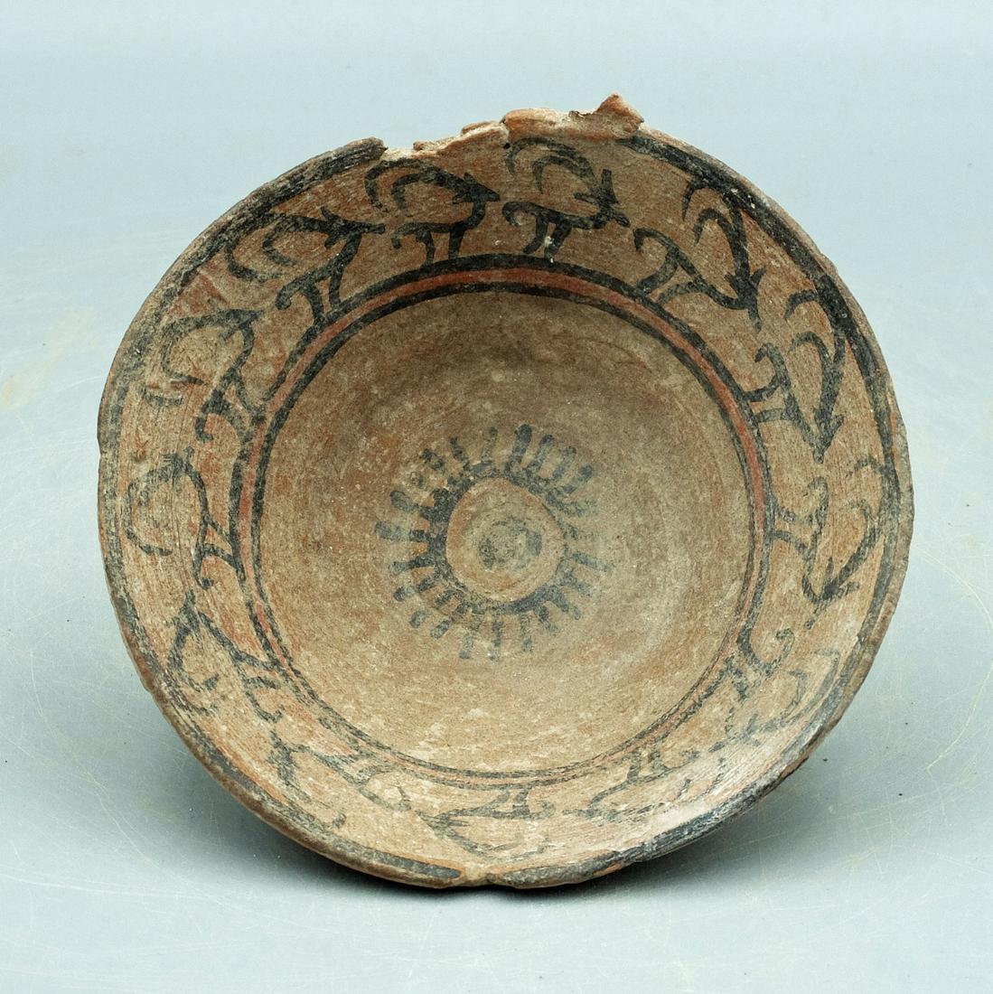 Harappan Dish - Indus Valley, ca. 2500 - 1800 BC: A sweet Harappan dish from the Indus Valley, ca. 2500 - 1800 BC. This finely made example is 4 inches in diameter and stands on a flat base. It is decorated with a series of Ibex set off with linear d