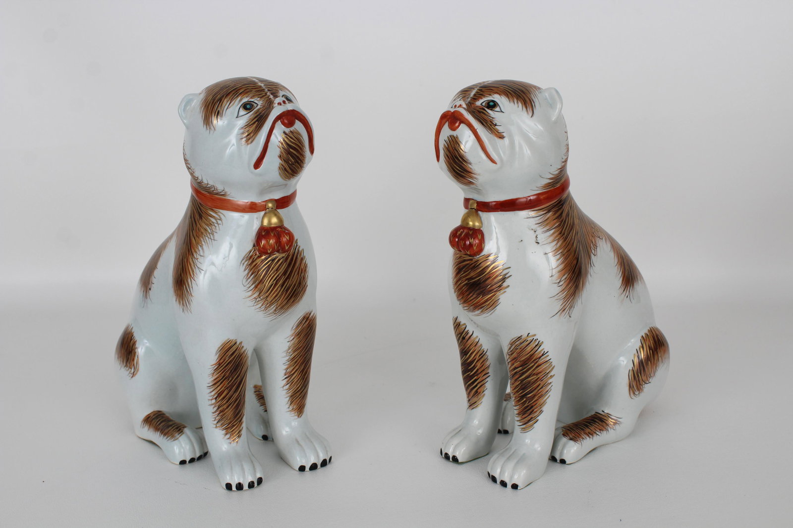 (2) Mottahedeh Porcelain Cats: (2) Mottahedeh Porcelain Cats, Lowestoft Reproduction. Marked on bottom of figure. Height: 8.75 in.