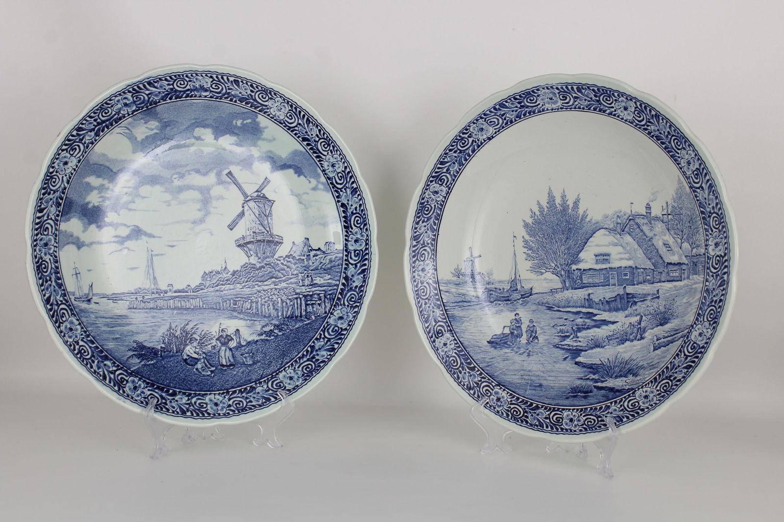 (2) Large Delft Porcelain Chargers: (2) Large Delft Porcelain Chargers. Diameter: 15 in.
