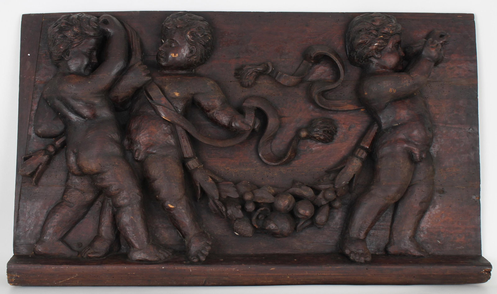 Antique European Cherubic Carved Wooden Relief: Antique European Cherubic Carved Wooden Relief. Size: 24 x 40 in.