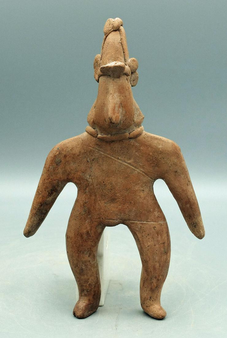 Colima Figure - West Mexico: A choice Colima figure from West Mexico, ca. 300 BC - 300 AD. This standing male is 7-3/4" tall and is depicted with arms spread wide. He is adorned with a fancy headdress denoting his high social ran