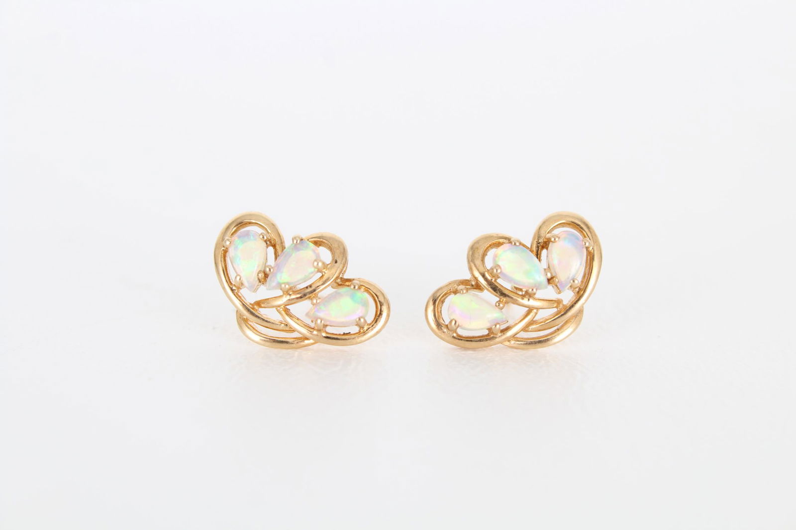 14K Gold & Tri-Stone Opal Earrings: 14K Gold & Tri-Stone Opal Earrings. Marked on back of earrings. Missing post backing. Overall Weight: 2.8 g / 1.8 dwt Size: 16 x 10 mm - All silver, gold and/or jewelry lots or invoices containing sai