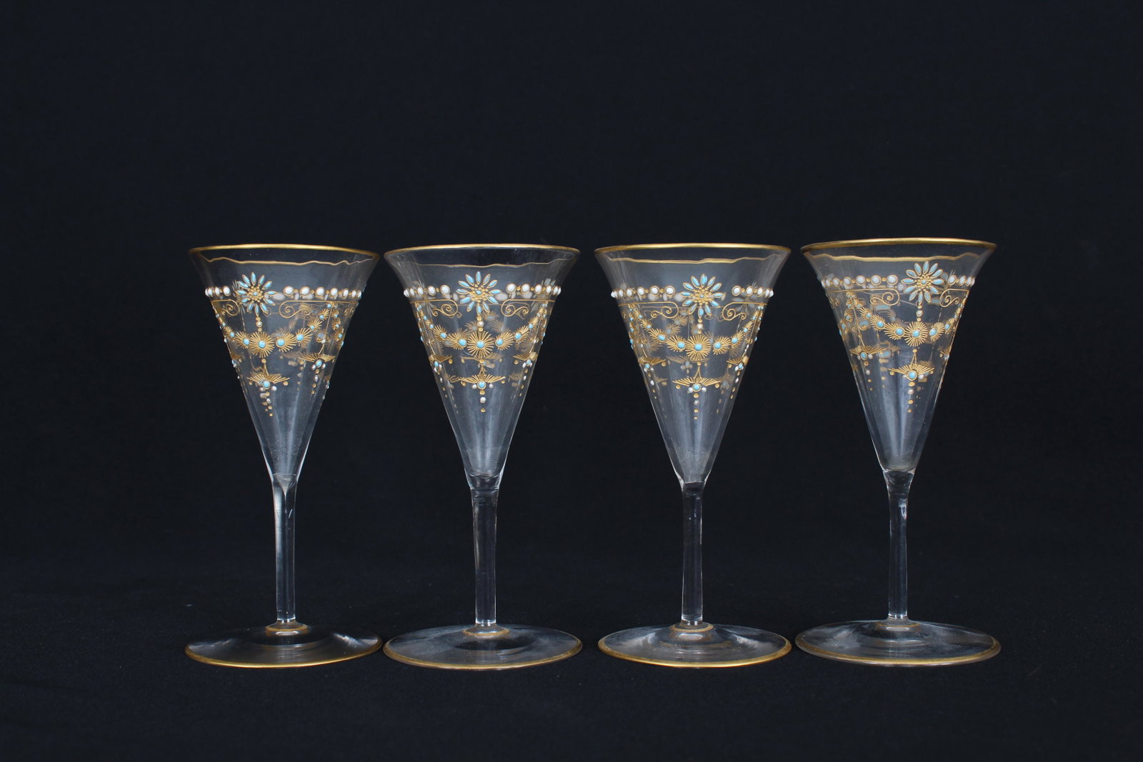 (4) Hand Painted Cordial Glasses: (4) Hand Painted Cordial Glasses. Each hand embellished with gilded rim and base. Appears to be unmarked. Height: 4.25 in.