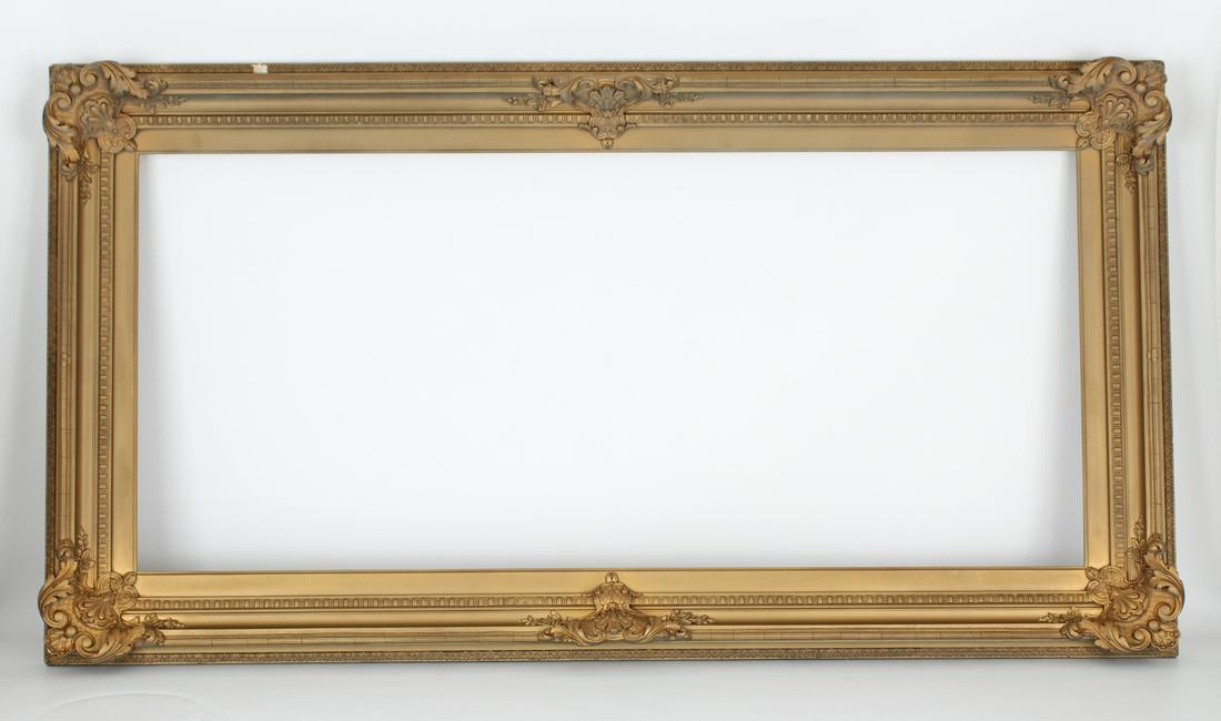 Gilt Wood Frame: Rabbet Size: 18.25 x 40.25 in. Overall Framed Size: 25 x 47 in.