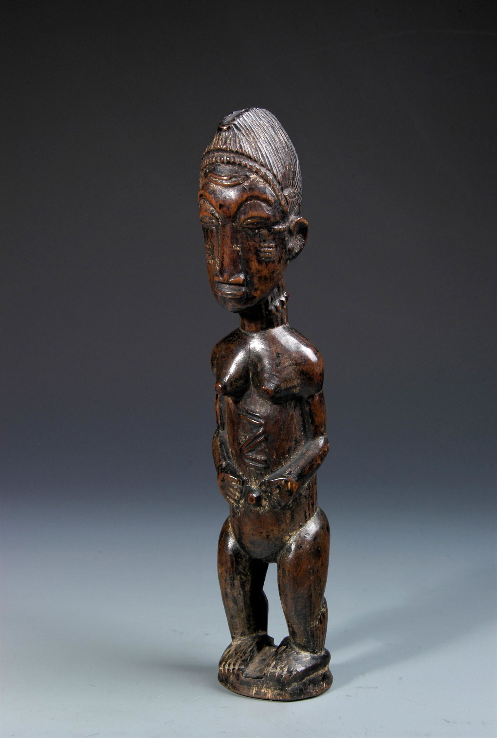 20th C. Baule Ppl, Female Dreamlover Figure: Mid 20th Century Baule people Female dreamlover figure. Ivory Coast, West Africa. Hardwood with traces of organic pigments. In very fine condition with lustrous, shiny, dark brown to medium brown, age