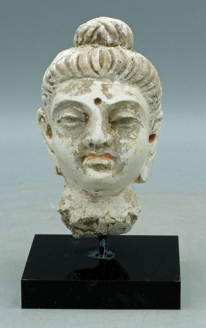 Gandharan Stucco Head, ca. 4th - 5th C. AD (1 of 3)