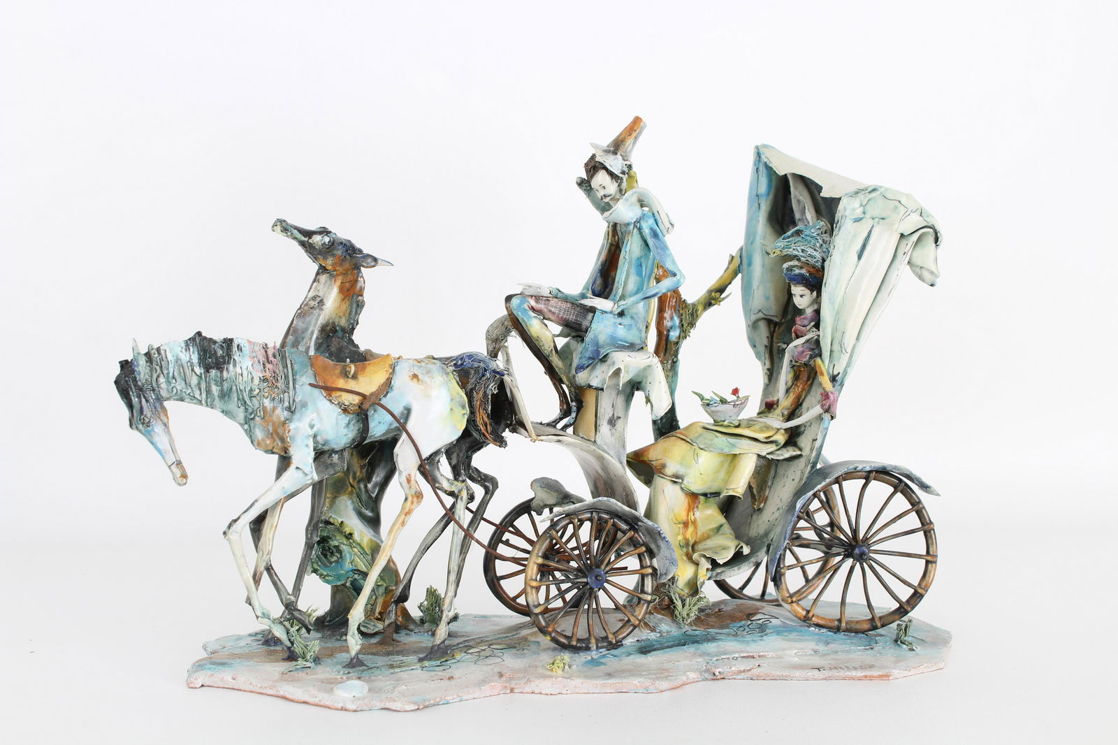 Toni Moretto (1929 - 2011) Lo Scricciolo Sculpture: Toni Moretto (1929 - 2011) Lo Scricciolo Sculpture of a woman in a horse-drawn carriage. Signed near edge in the lower portion. Dimensions: 8 x 13 x 4.5 in.