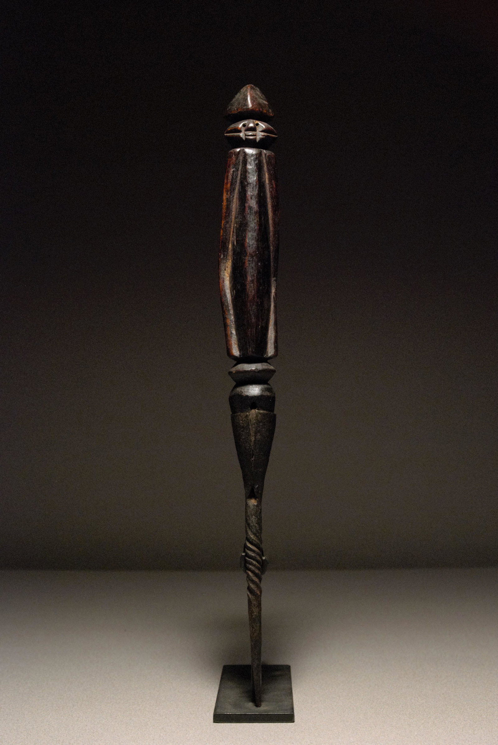 Wurkun Ppl Healing Figure Wundul - West Africa: Healing figure Wundul Wurkun people Nigeria, West Africa Early-mid 20th Century Wood with iron Size: 16 x 1.5 in. In fine condition with dark brown, varied, aged, shiny patina; oxidized metal Provenan