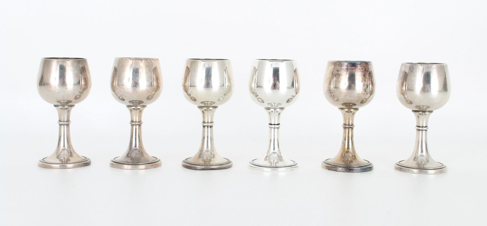 (6) Alpacca Silver Plate Cordials: (6) Alpacca Silver Plate Cordials. WMF - WURTTEMBERGISCHE METALLWARENFABRIK hallmark on base. Heights: 2.75 in.