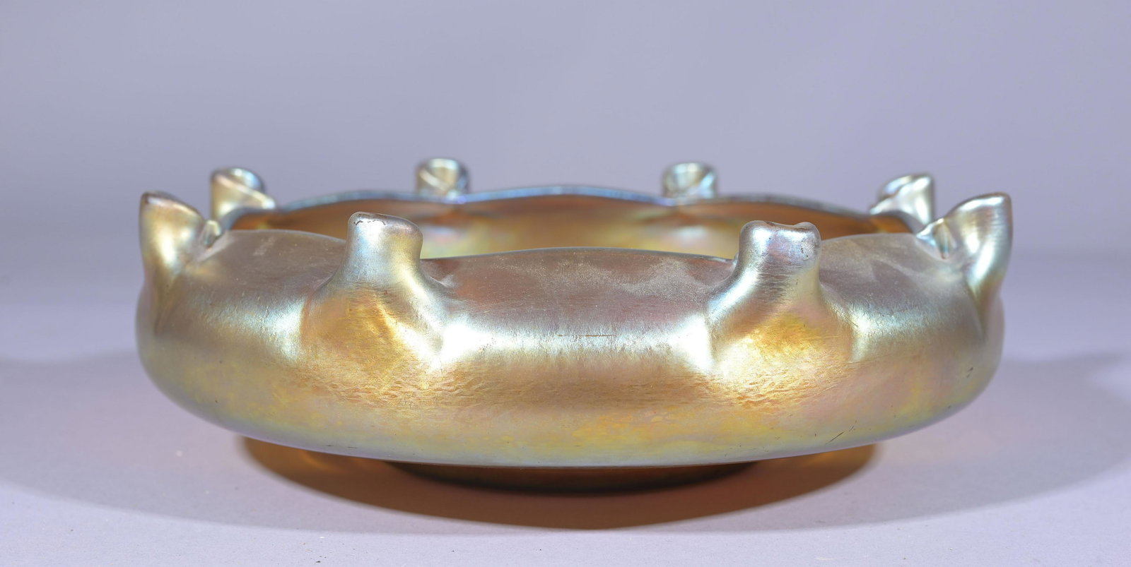 Aurene Glass Pinched Bowl: Aurene Glass Pinched Bowl. Marked on base. Width: 9.5 in.