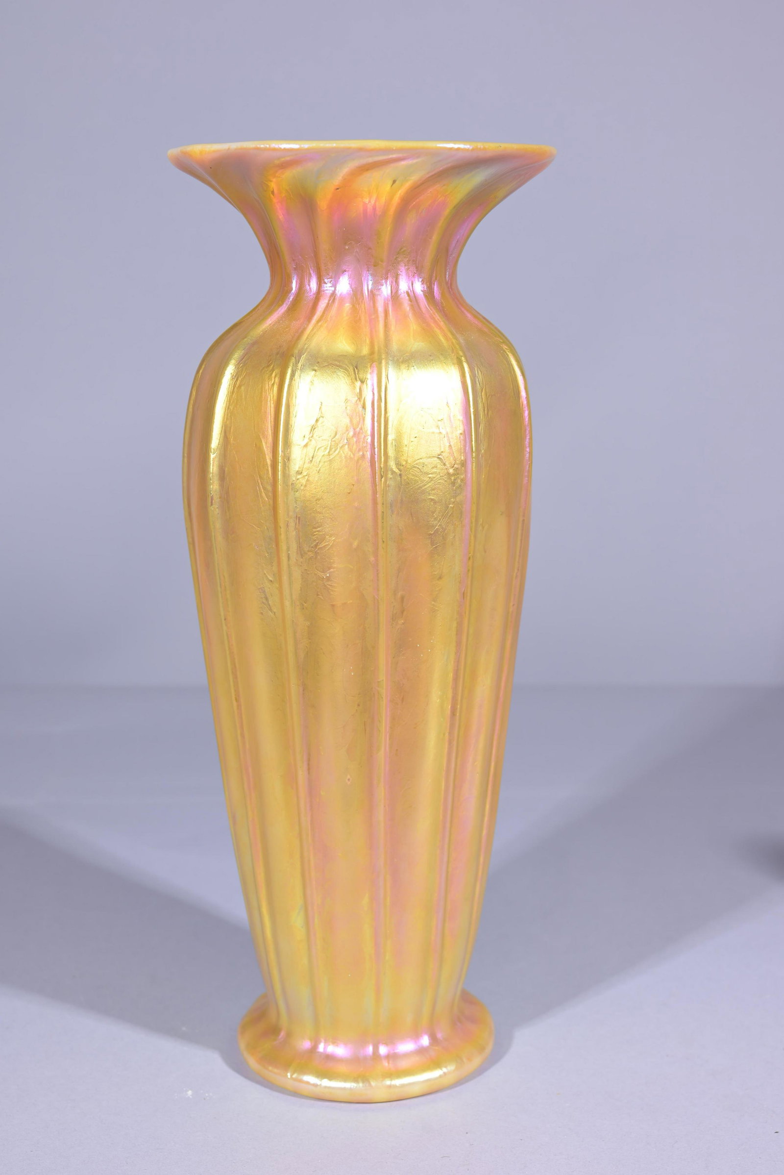 Lundberg Studios Regal Ribbed Art Glass Vase: Lundberg Studios Regal Ribbed Art Glass Vase. Marled on base. Height: 13.25 in.