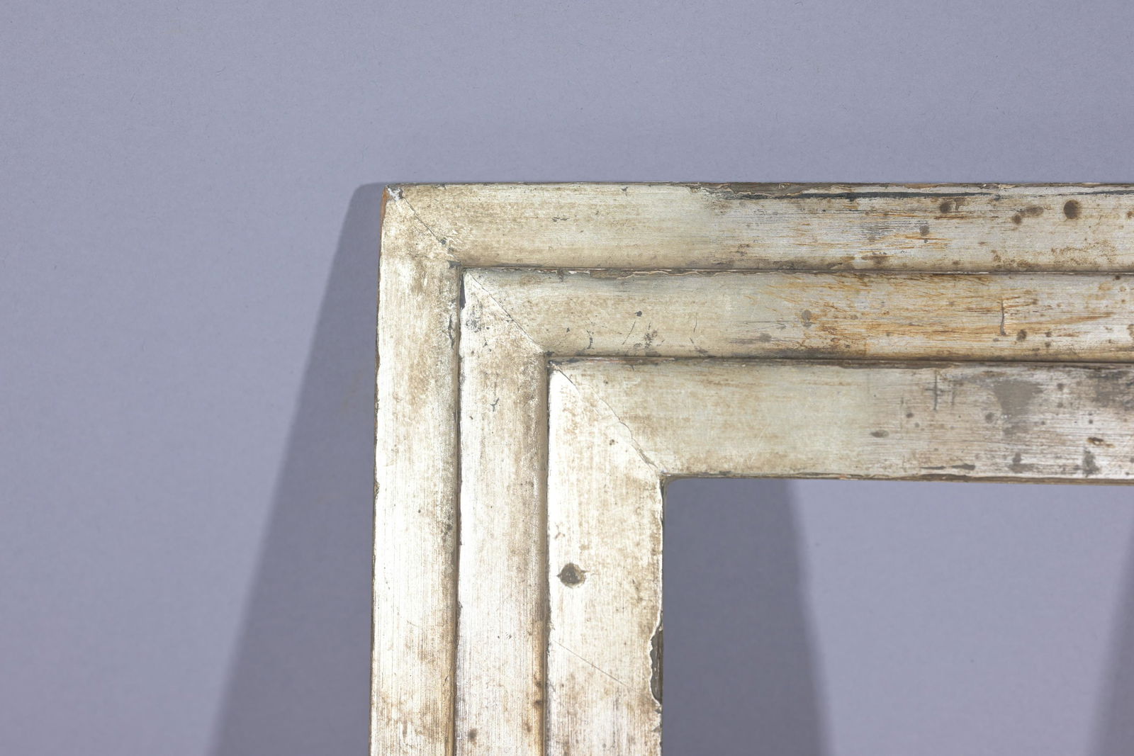 French 1920-30 Silvered Frame - 9.75 x 6.75: French 1920-30's Silvered/Stepped Frame. Rabbet Size: 9.75 x 6.75 in. Overall Framed Size: 14 x 11 in. (02-131) (108) Provenance: The historic period frame collection of Eli Wilner. The collection pre