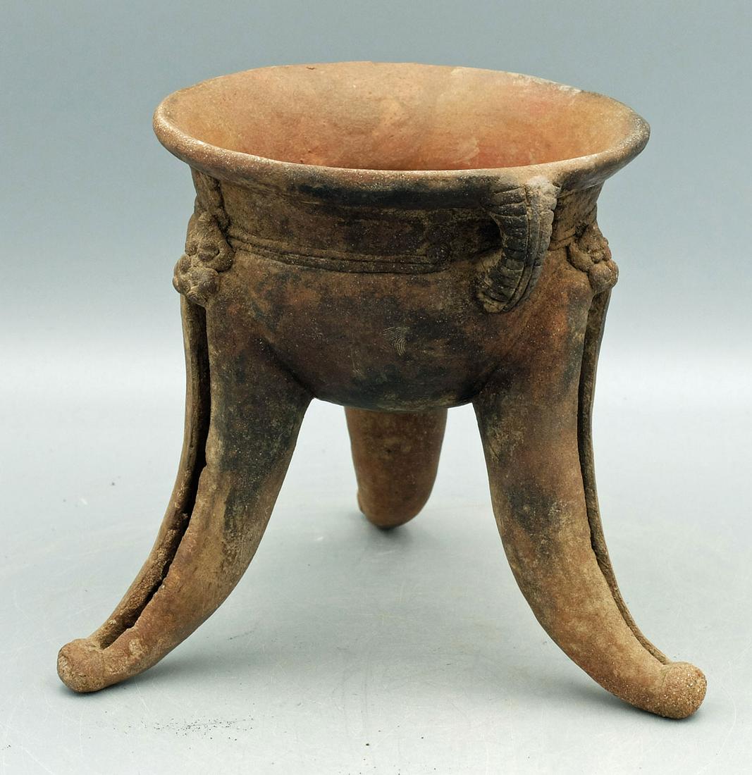 Pre-Columbian Chocolate Bowl - Chiriqui region: A choice Pre-Columbian chocolate bowl from the Chiriqui region of northern Panama, ca. 1200 - 1500 AD. This fine tripod vessel is 5-1/2 in. high, 5 in. in diameter and stands on a trio of hollow legs 
