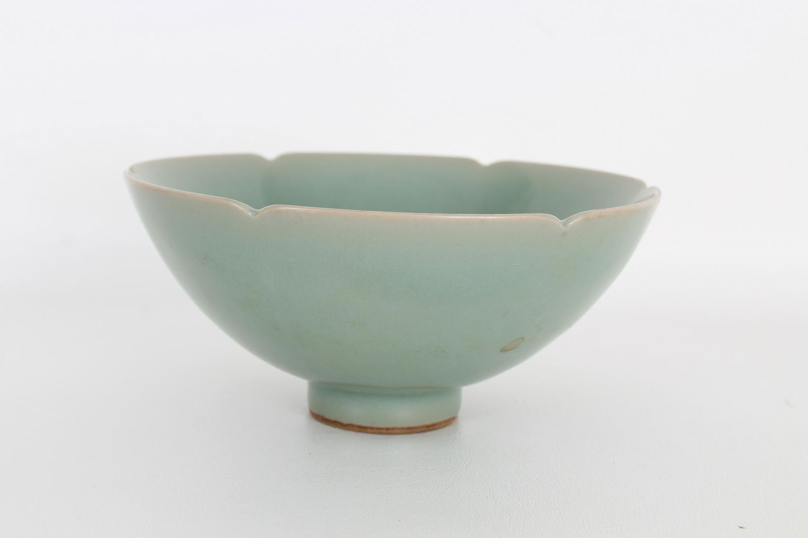 Chinese Longquan celadon lobed rim bowl: Chinese Longquan celadon lobed rim bowl. Provenance: Private Montreal, Canada estate. Dimensions: 3 x 6.5 in.