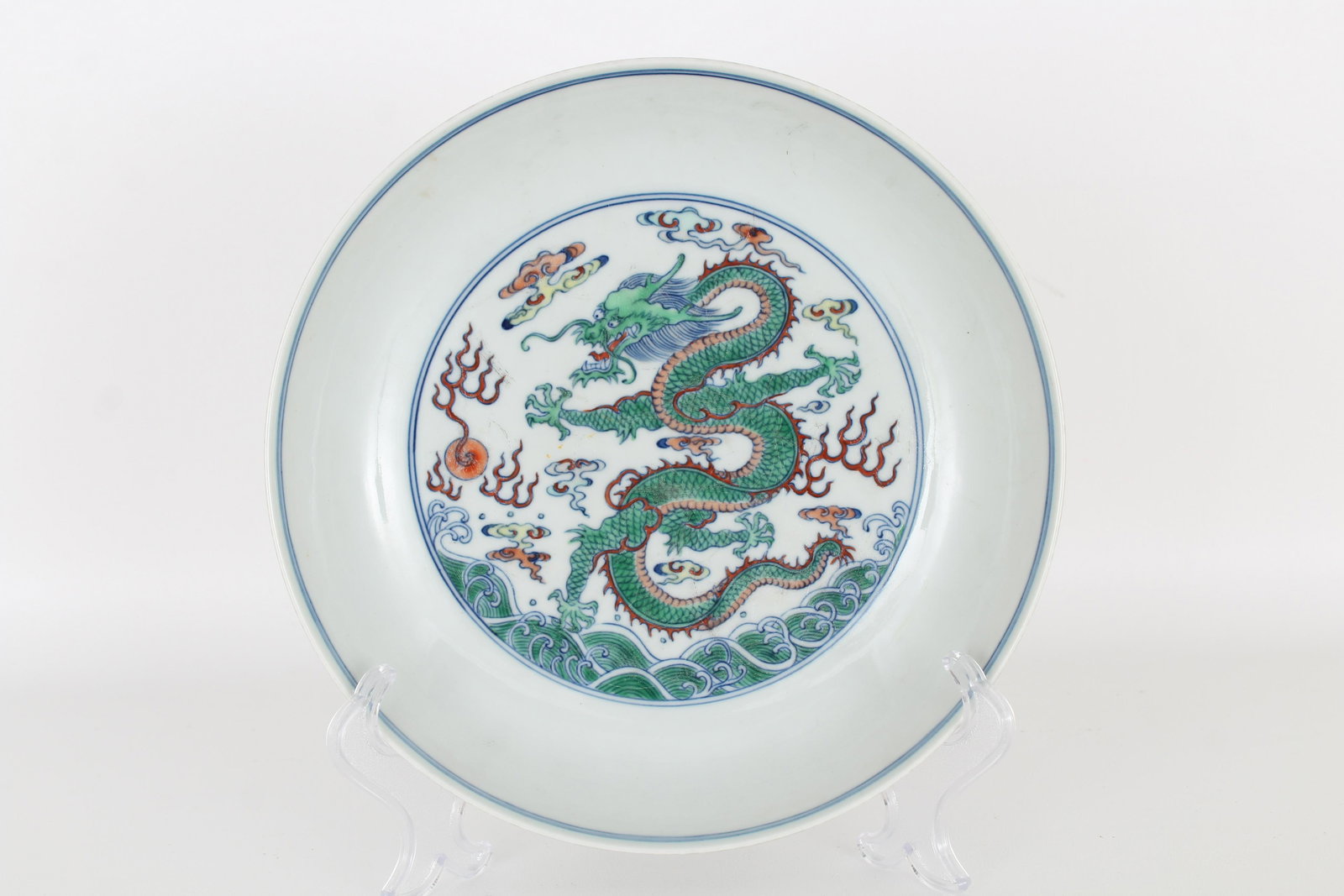 Chinese famille rose 'dragon' dish, Yongzheng mark: Chinese famille rose 'dragon' dish, Yongzheng mark. Provenance: Private Montreal, Canada estate. Dimensions: 1 5/8 x 8 in.