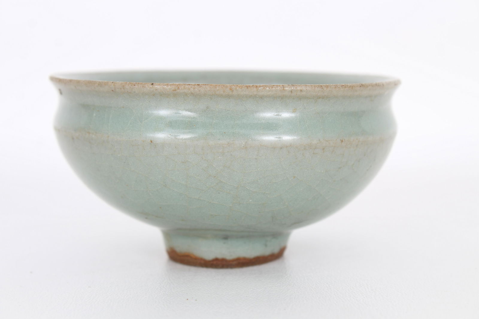 Chinese Longquan Celadon Bowl: Chinese Longquan celadon bowl. Provenance: Private Montreal, Canada estate. Size: 2.25 x 4.25 in.
