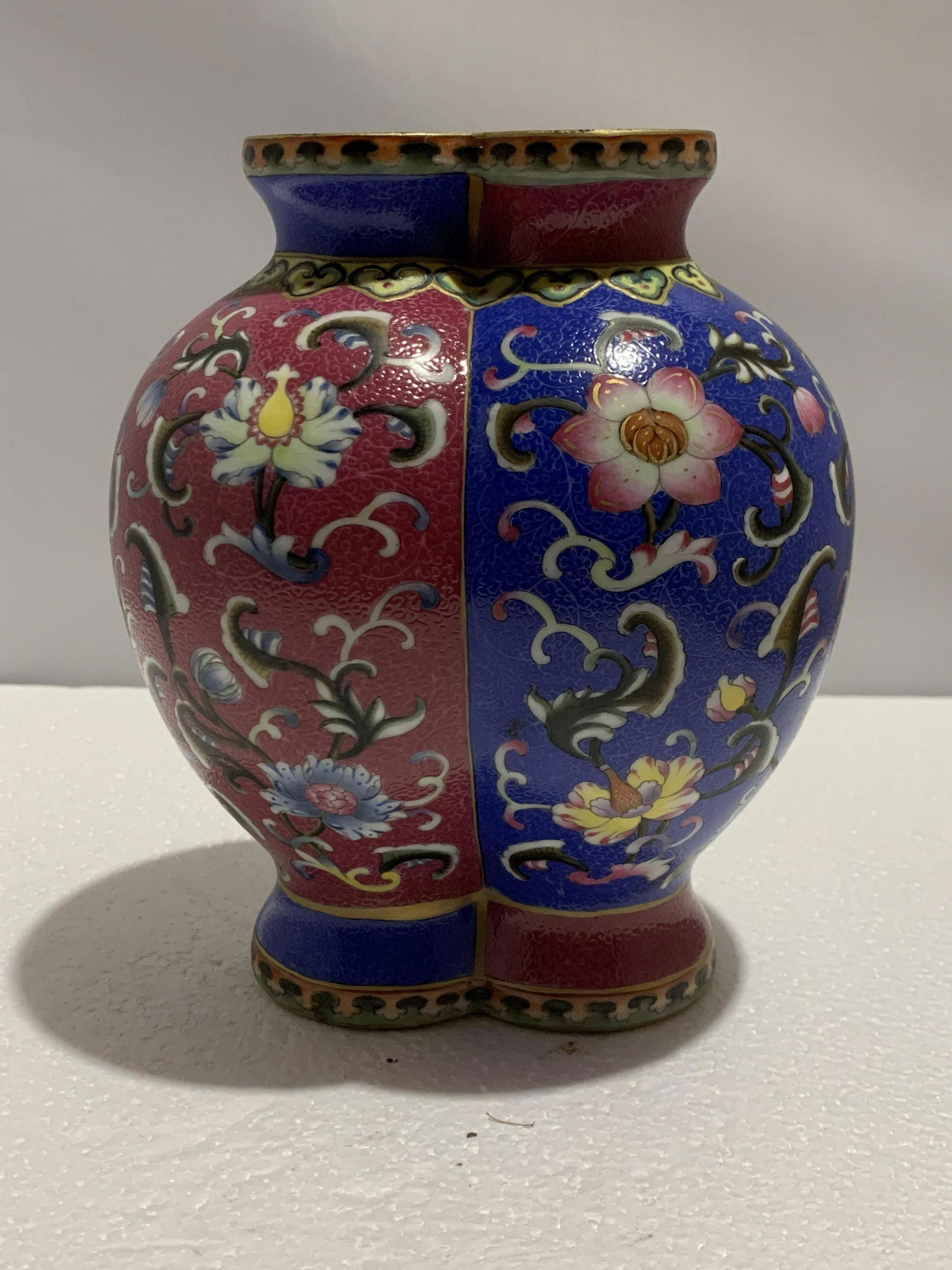 Chinese Yangcai twin vase, Qianlong mark: A Chinese Yangcai twin vase, Qianlong mark, H. 18 cm Provenance: Private collection British Columbia, Canada Condition: Except traces of age including but not limited to light scratches and stains, ot