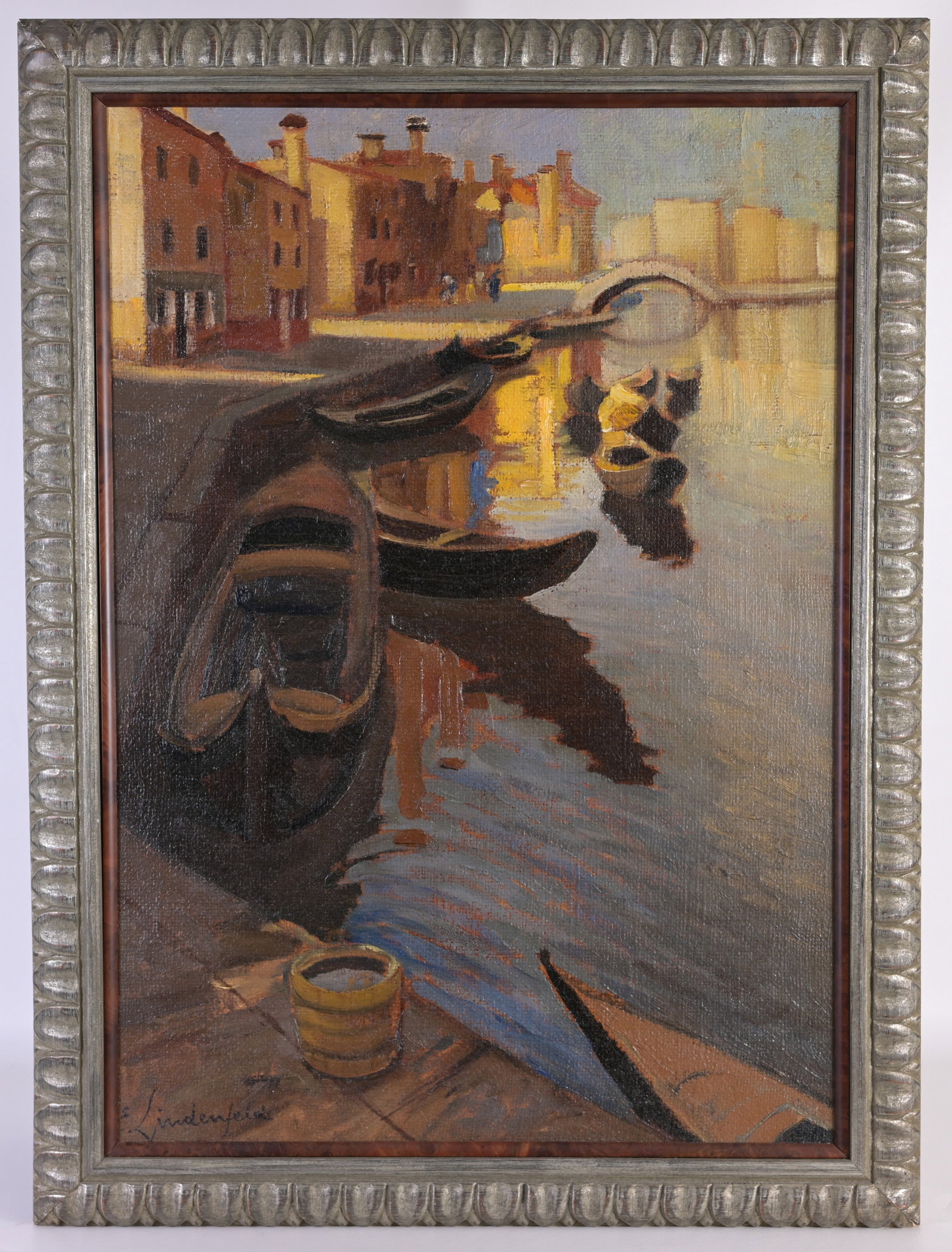 Emil Lindenfeld (American 1905-1986): Emil Lindenfeld (American 1905-1986) "Venice Canal w/ Gondolas" Oil on Canvas. Signed lower left. Old label verso. Sight Size: 27.5 x 19.75 in. Overall Framed Size: 31 x 23 in.
