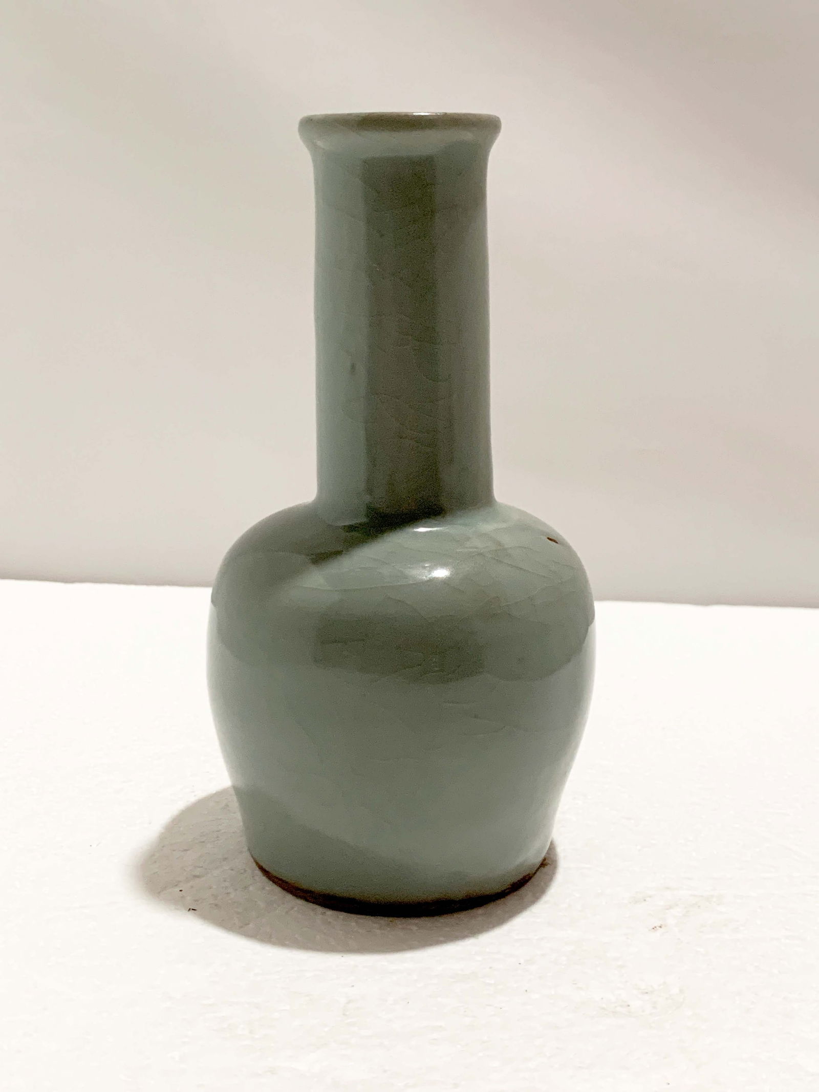 Chinese Celadon Vase: A Chinese Celadon Vase, H. 17.5 cm Provenance: Estate of the Lam's family from Hong Kong