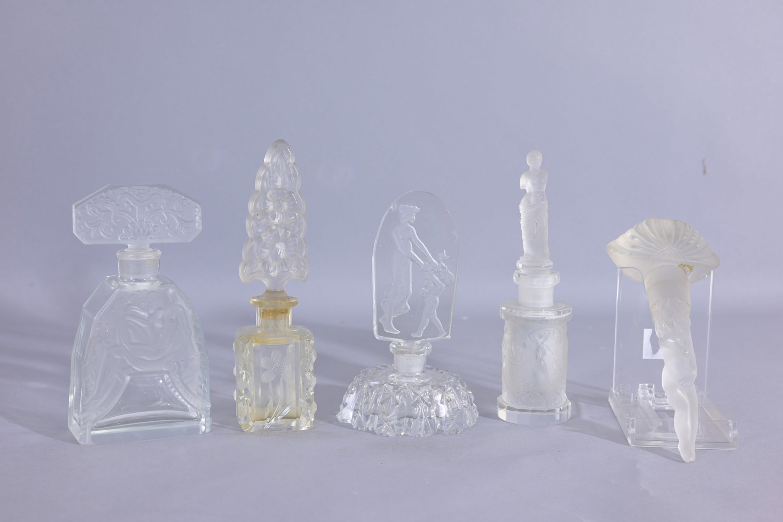 (5) Assorted Czech Cut Class Perfume Bottles: Clear Glass Bottle - Clear glass square shaped with molded flowers on each side. Etched molded corners, semi frosted glass stopper with 2 sided etched flowers for design. - Clear Glass - Mother & Baby