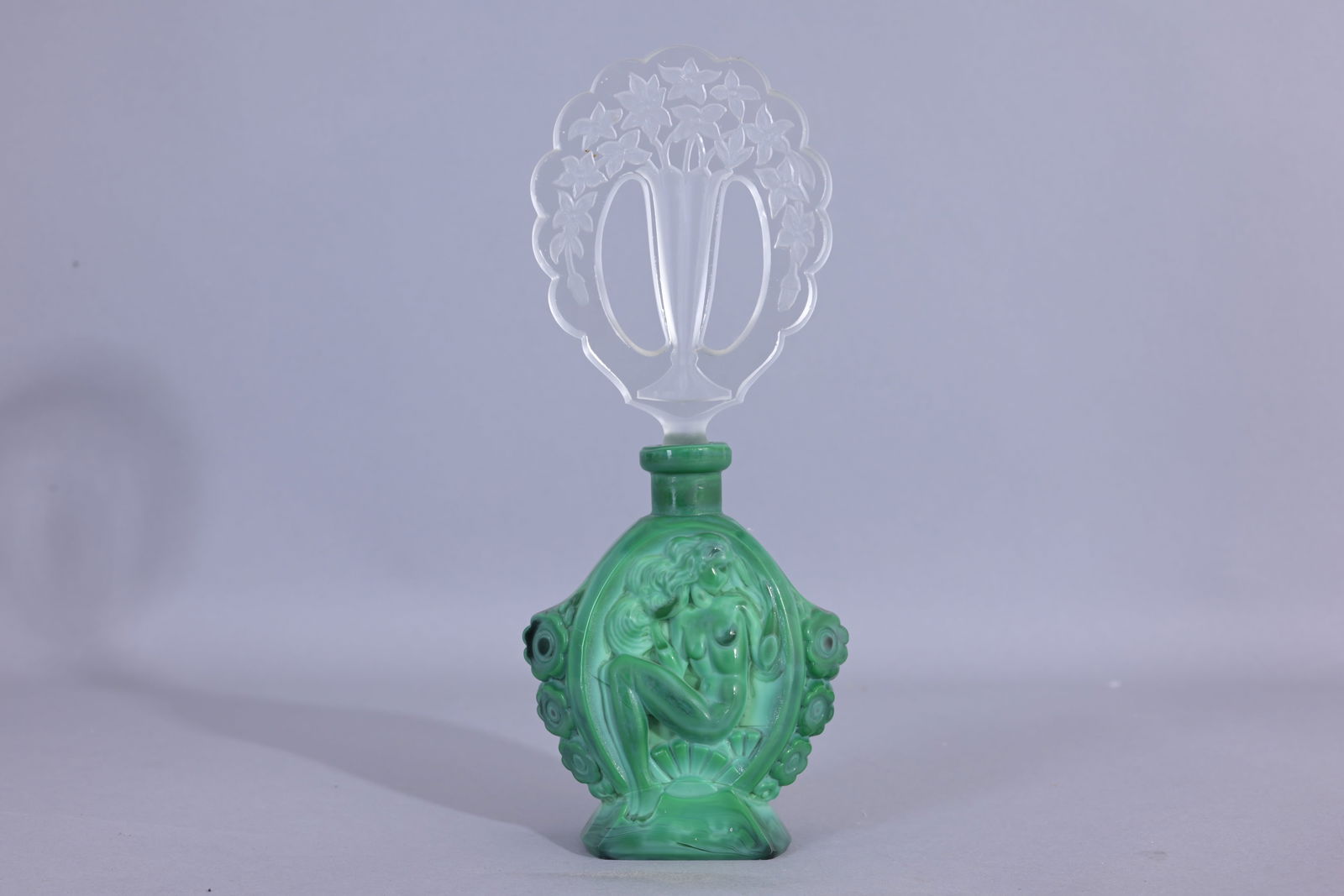 Ingrid Perfume Bottle: INGRID perfume bottle, circa 1920s, in opaque green crystal with clear and frosted stopper. (Czech - 14) Provenance: single owner lifetime collection from Jacksonville, FL - Entire collection has been