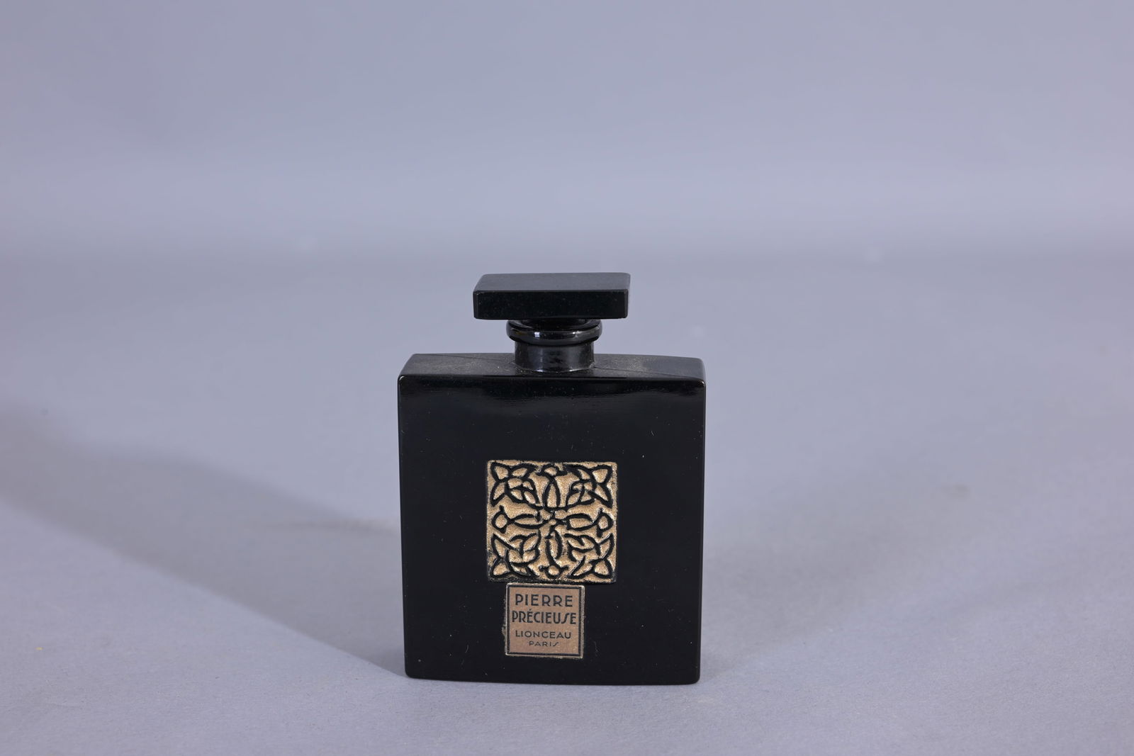 1927 Jollivet - Lionceau Pierre Precieuse Bottle: 1927 Jollivet - Lionceau Pierre Precieuse Bottle w/ stopper. Black Glass w/ Stopper. (Lionceau - 5) Provenance: single owner lifetime collection from Jacksonville, FL - Entire collection has been dona