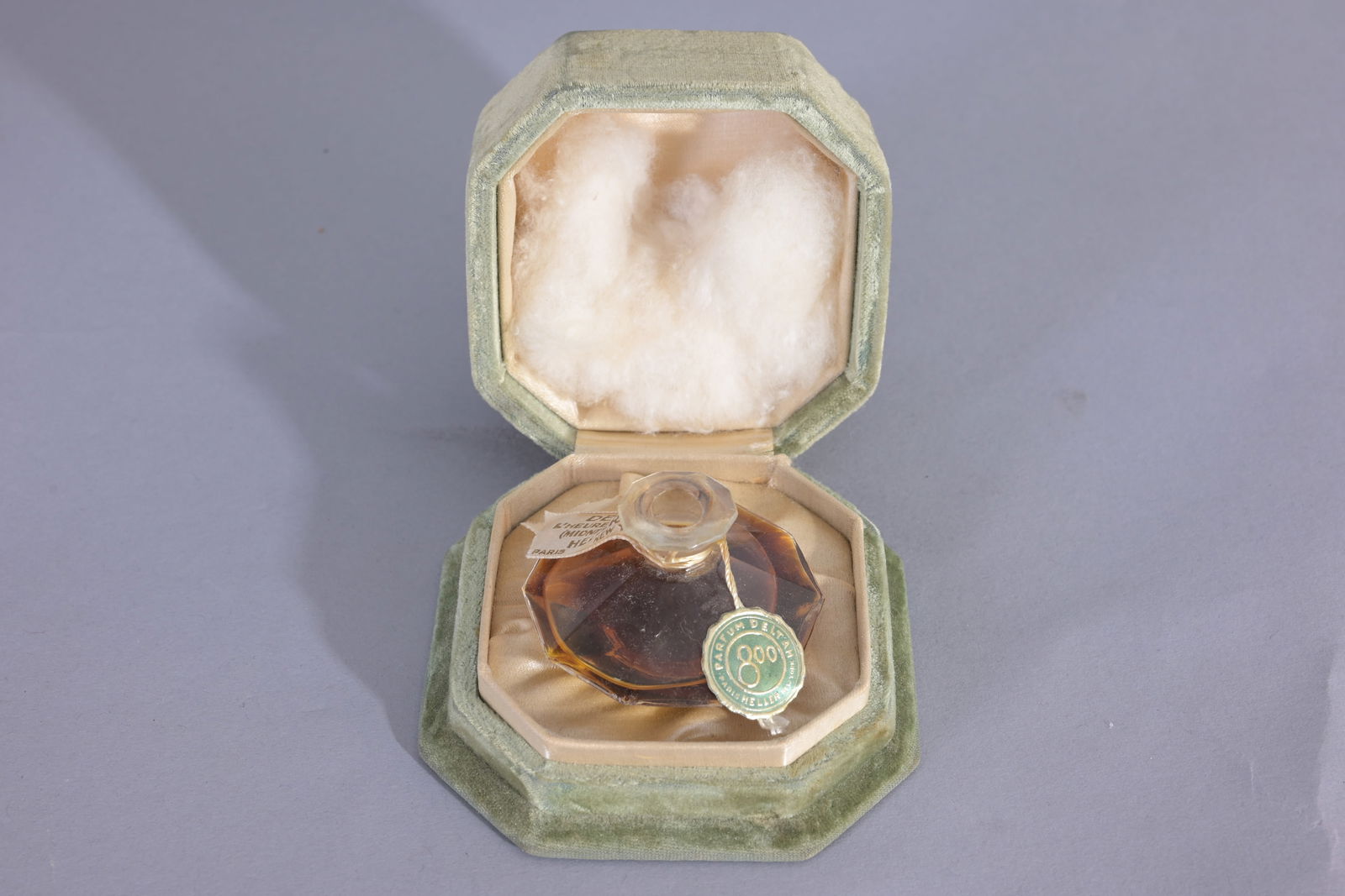 Heller, Deltah Perfume Bottle: Heller, Deltah 800, perfume bottle in original greeen velvet box. (Misc - 8) Provenance: single owner lifetime collection from Jacksonville, FL - Entire collection has been donated to St. Elizabeth An