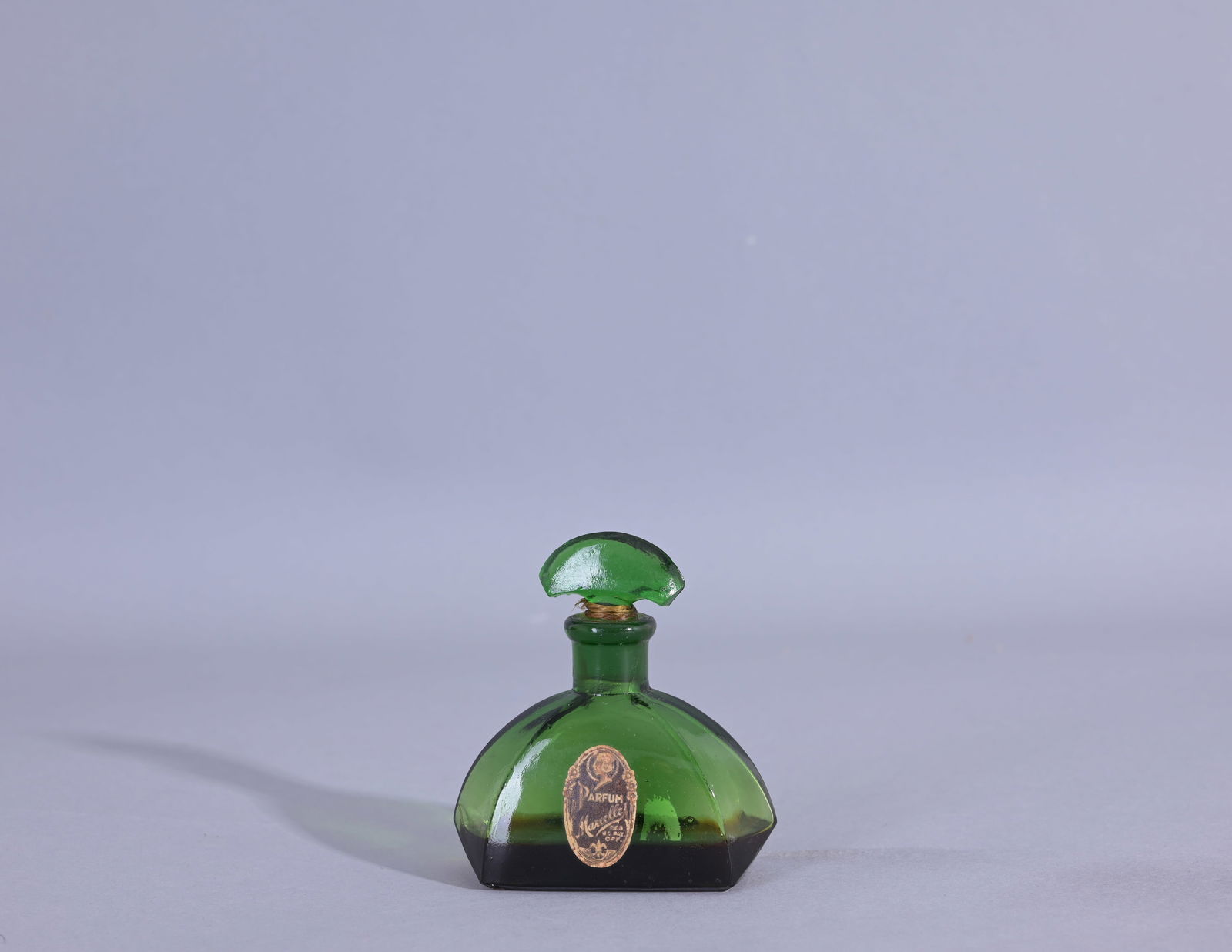 Marcelle perfume bottle green: Marcelle perfume bottle green, Narcissus 1932. (Misc - 1079) Provenance: single owner lifetime collection from Jacksonville, FL - Entire collection has been donated to St. Elizabeth Ann Seton Catholic