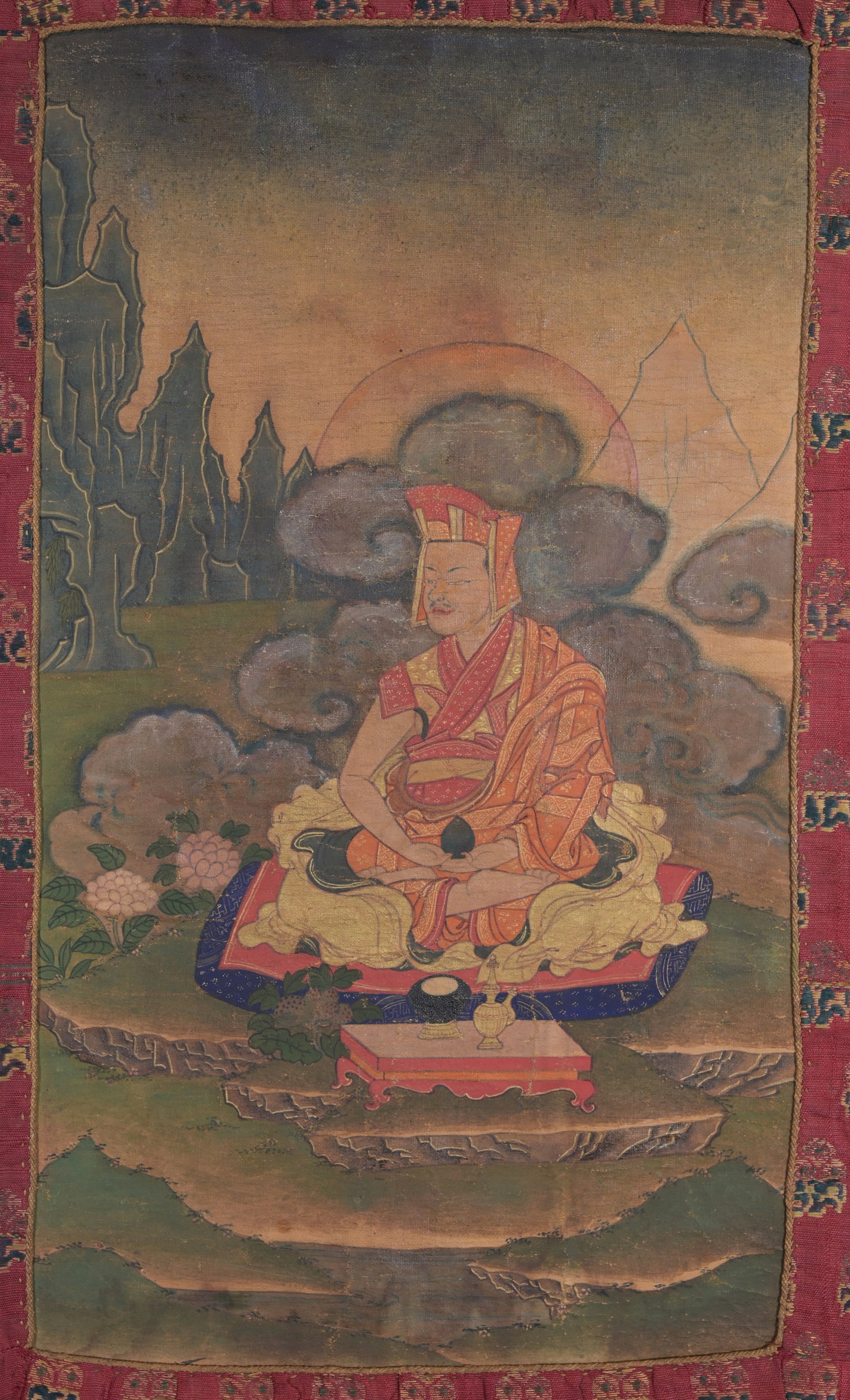 Antique Tibetan Thangka, Gampopa. Signed.: Antiuqe Tibetan Thangka depicting Gampopa. Signed and inscribed verso. With artist's thumbprint verso. Hand painted on silk. Provenance: Estate of Francis Luis Mora (1874 - 1940). Image Size: 13 x 7 3