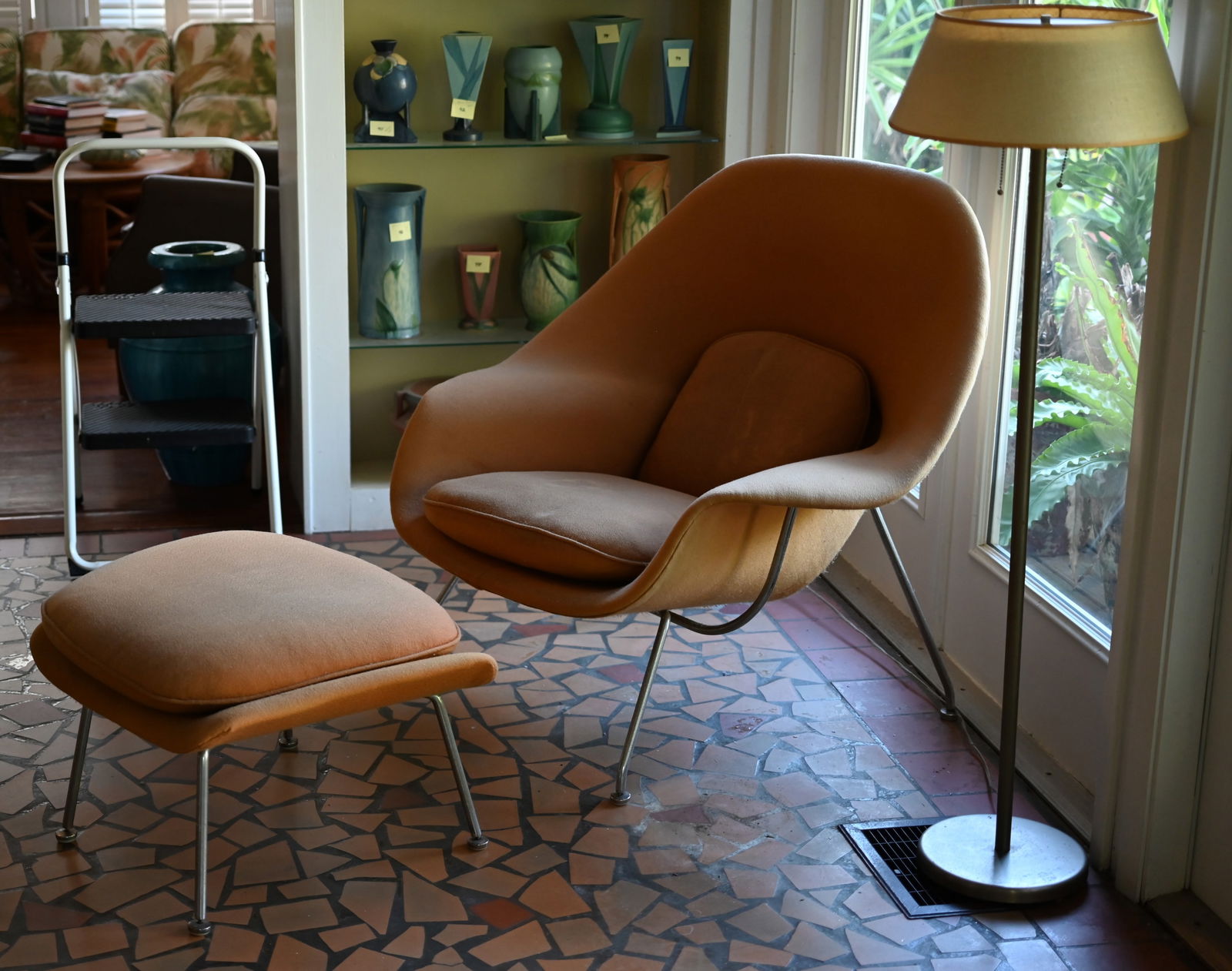 Eero Saarinen for Knoll, Womb Chair & Ottoman: Eero Saarinen for Knoll (American), circa 1950. Mid-Century Modern sculptural "Womb" chair and ottoman in a natural colored upholstery and chrome-plated steel support and legs. Two cushions for chair