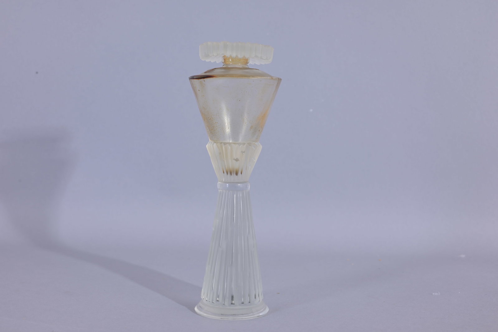 Lucien Lelong "Impromptu" Perfume Bottle: Lucien Lelong Impromptu bottle features an hourglass shape with textured patterns along the body and stopper. circa 1937 (Lucien Lelong - 12)