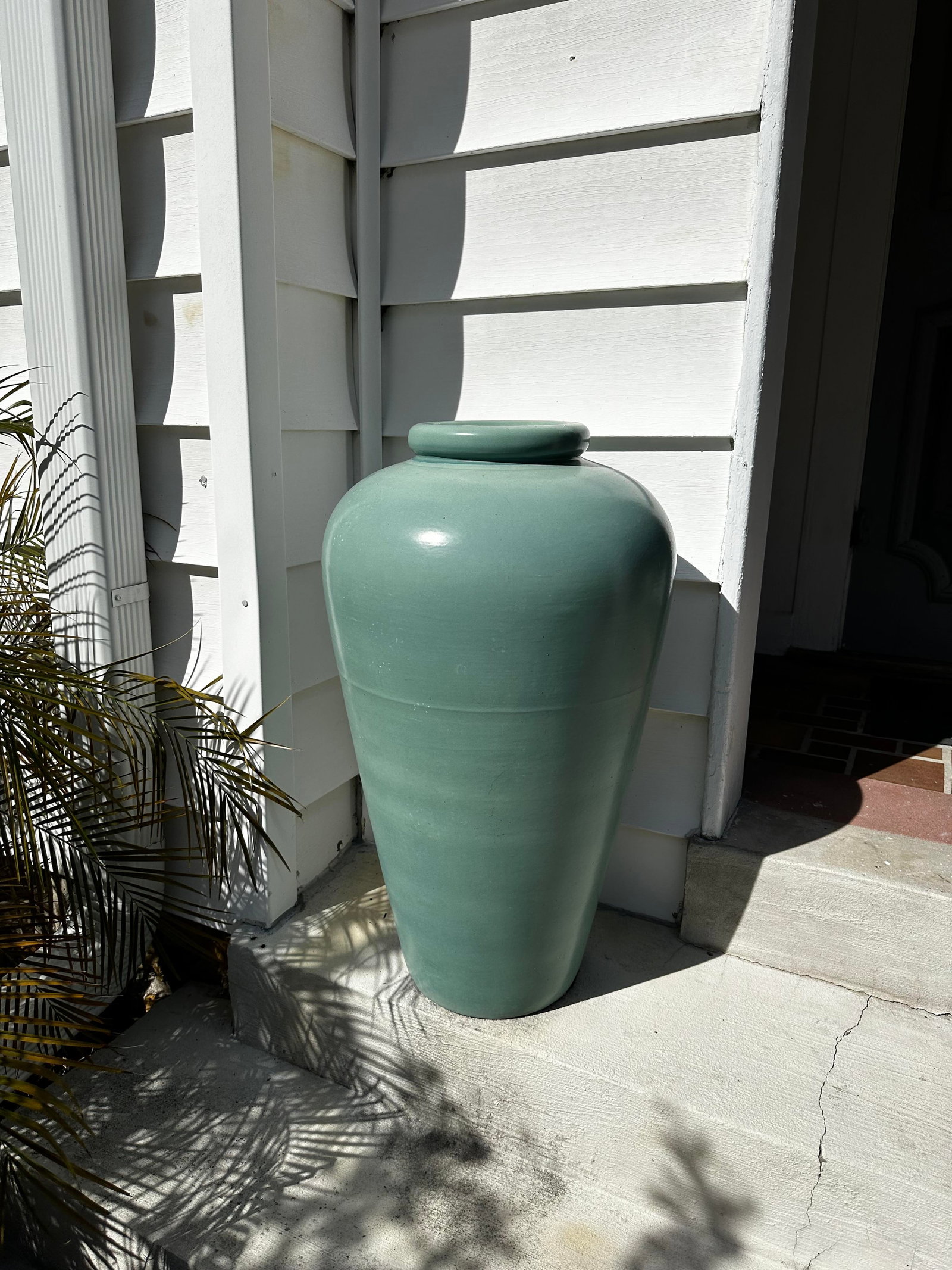 Large Green Mid Century Pottery Jardiniere: Large Green Mid Century Pottery Jardiniere. Provenance: Deceased estate of Jack Vinales (Sarasota, Florida). Height: 31 in.
