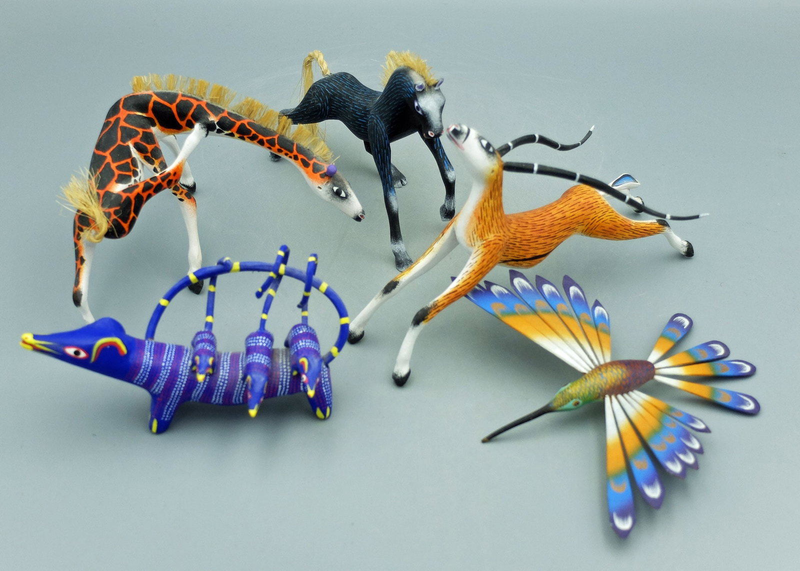 group of five excellent alebrijes - Oaxaca, Mexico: A group of five excellent alebrijes purchased in Oaxaca, Mexico in 2000 directly from the artists. Included are three from the now famous Sergio Aragon, whose work can be found in a number of US museu