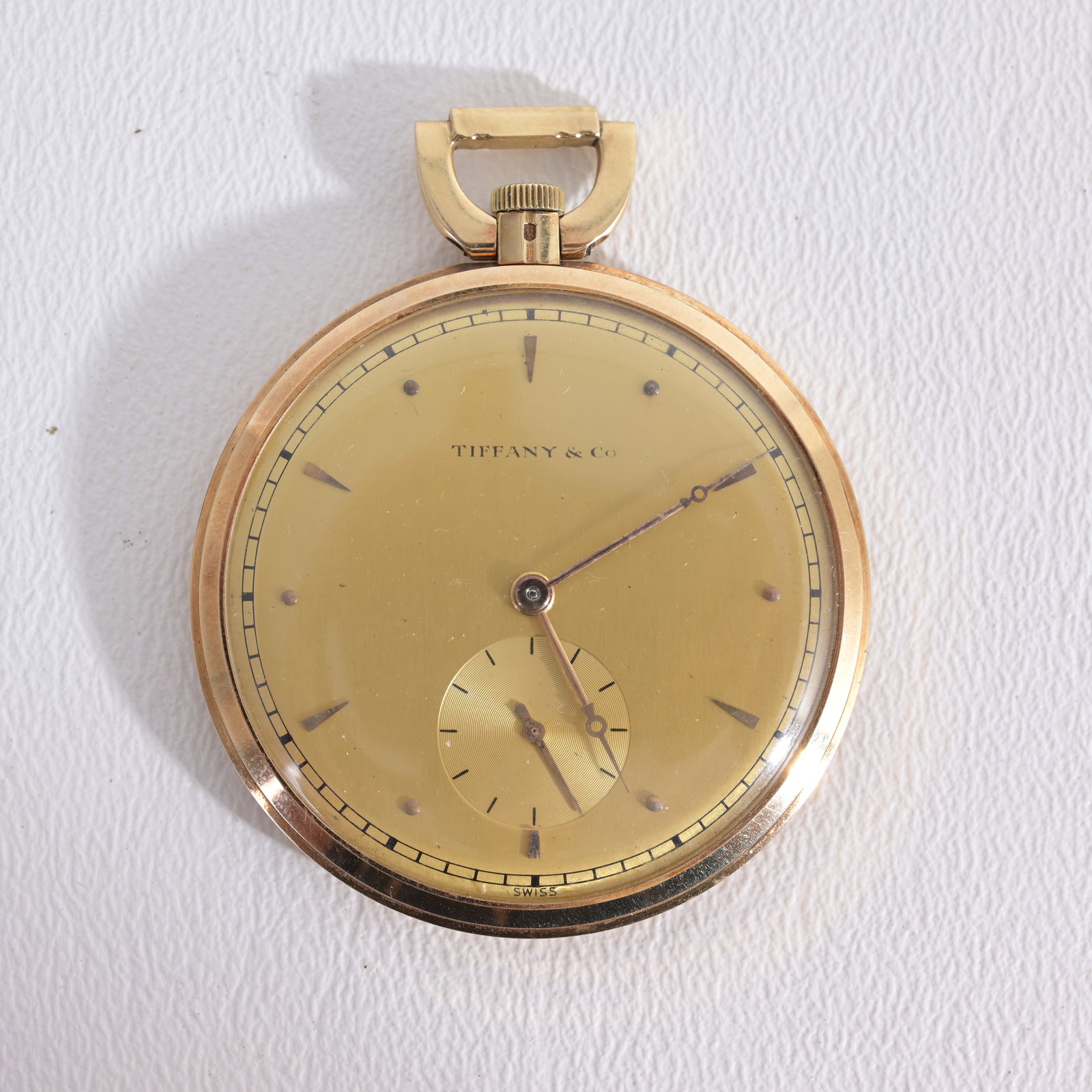 14K Tiffany & Co. Gold Swiss Pocket Watch: 14k Tiffany & Co. Gold Swiss Pocket Watch. Engraved FRD verso. Casing has not been opened Dimensions: 4.4 cm