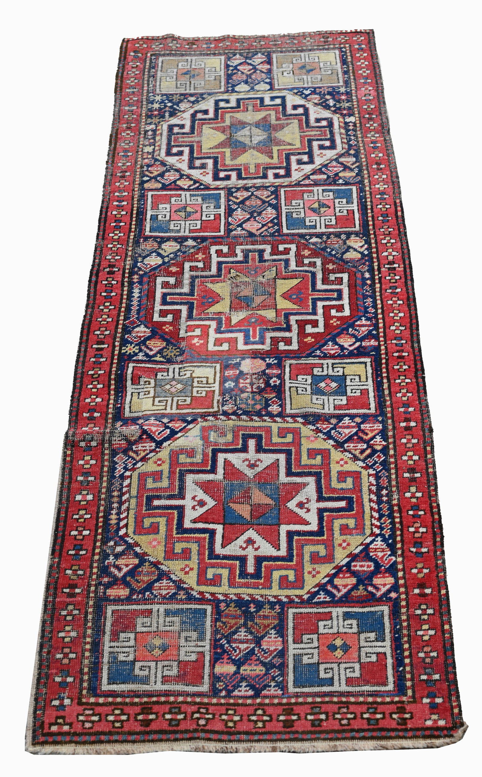 Antique Caucasian Rug - 6'7" x 2'1": Antique Caucasian Rug Size: 79 x 25 in. (6'7" x 2'1") - Provenance: this item comes from the private collection of Lou A. and Barbara B. Pritchett. Lou Pritchett was the ex-Vice President of Procter a