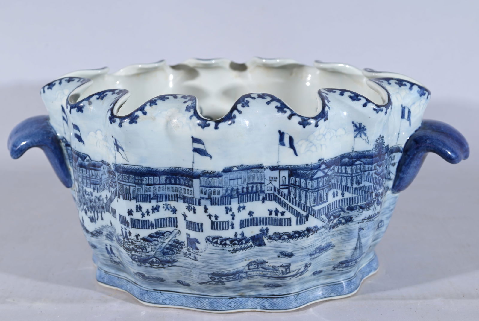 Chinese Blue/White Planter, View of Hongs: Chinese Blue/White Porcelain Planter, View of Hongs. Marked on underside. Height: 8 in. Width: 17 in. Depth: 11 in. - Provenance: this item comes from the private collection of Lou A. and Barbara B. P