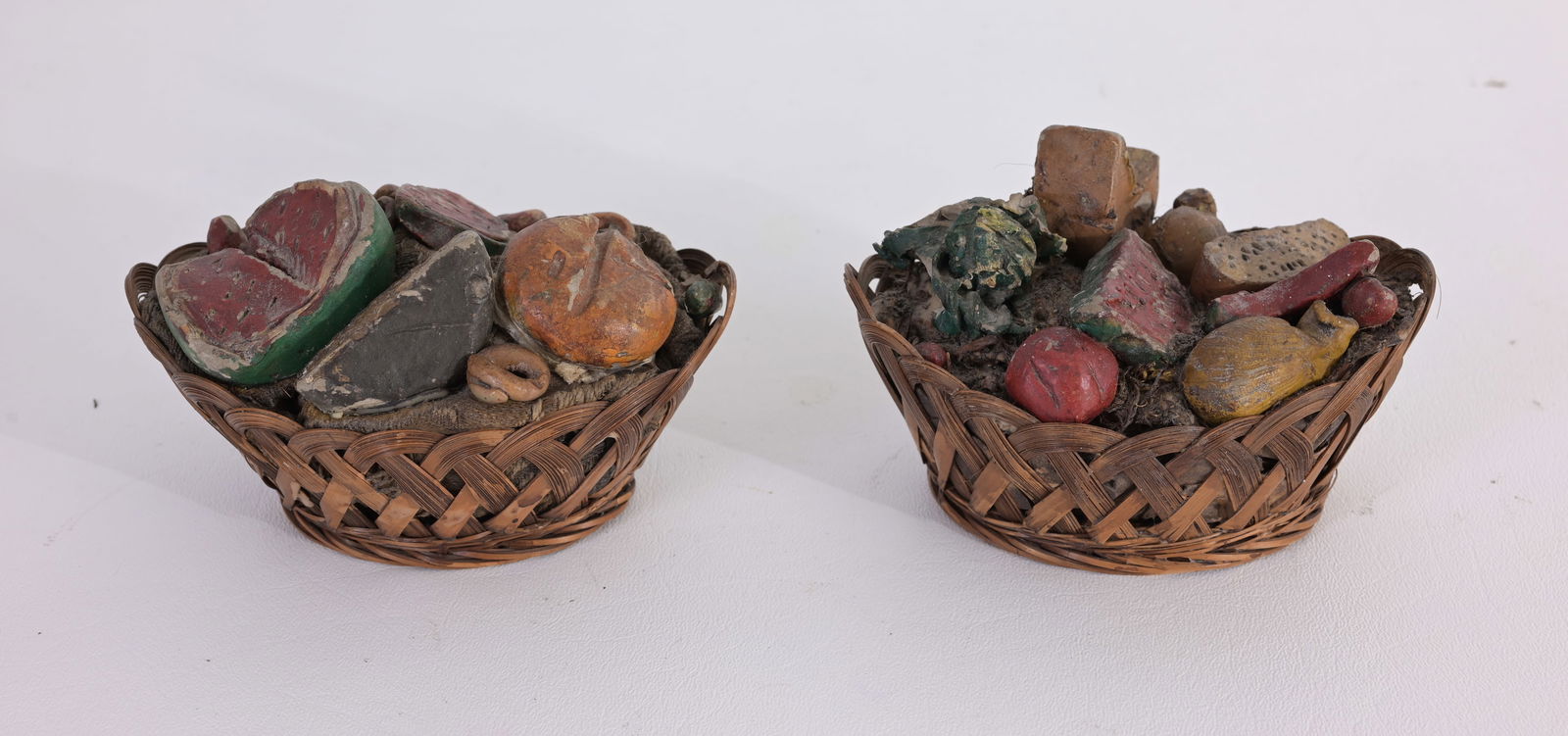 (2) 18th C. Neapolitan Creche Clay Baskets: (2) 18th Century Neapolitan Creche Baskets, Hand Carved Painted Clay and Wicker Sizes: 3 x 5 x 3.5 in.