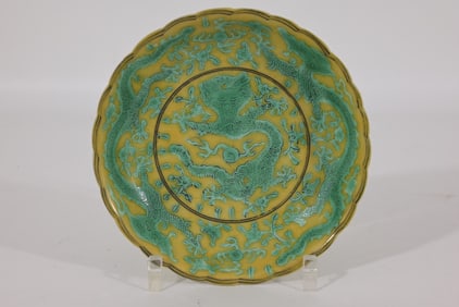 Chinese green decorated yellow ground dish, marked