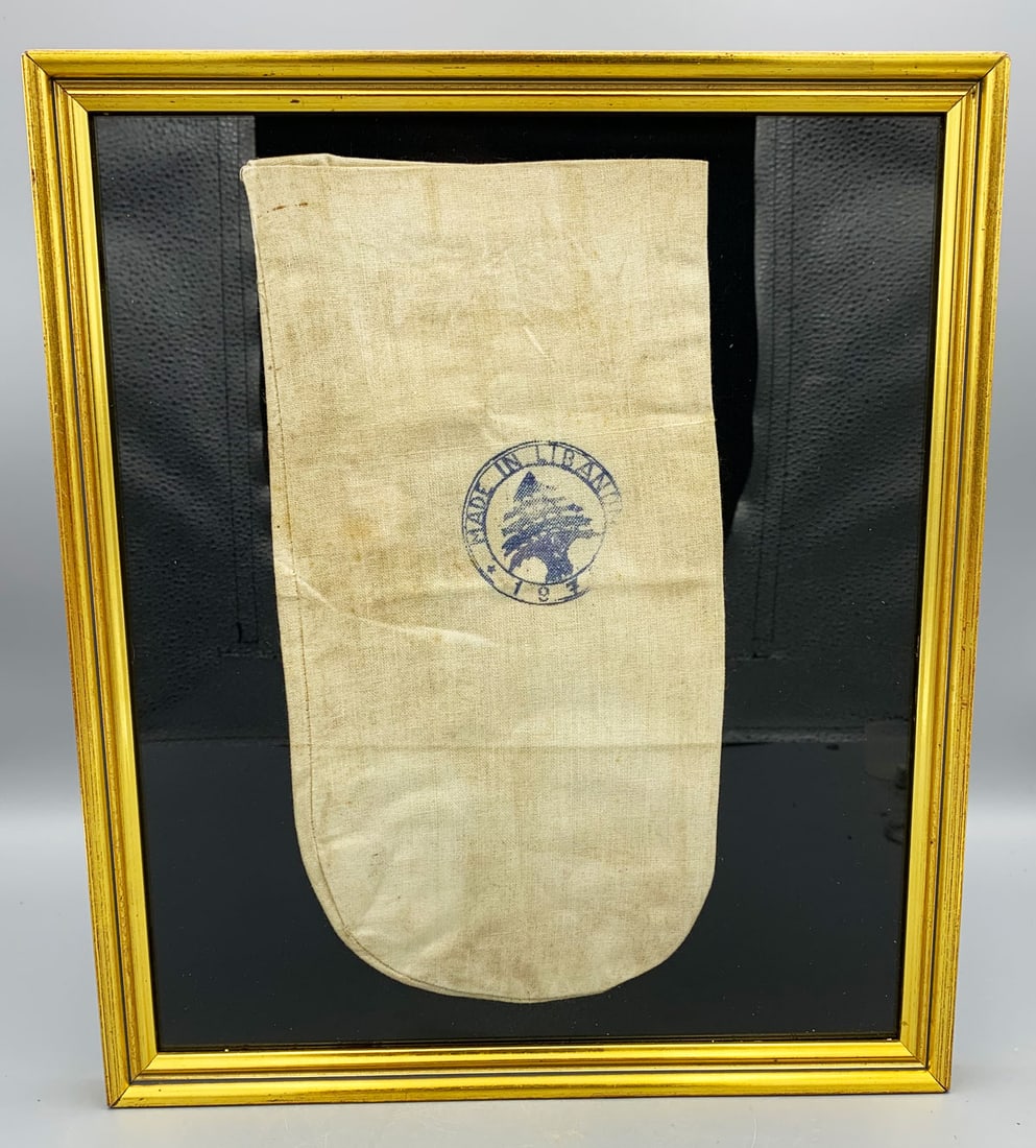 rare 1972 hashish bag from the Beqaa Valley: A rare 1972 hashish bag from the Beqaa Valley in eastern Lebanon. This simple textile bag is 10 in. x 5-1/4 in. and features the official stamp. A rare example of cannabis memorabilia, nicely framed a