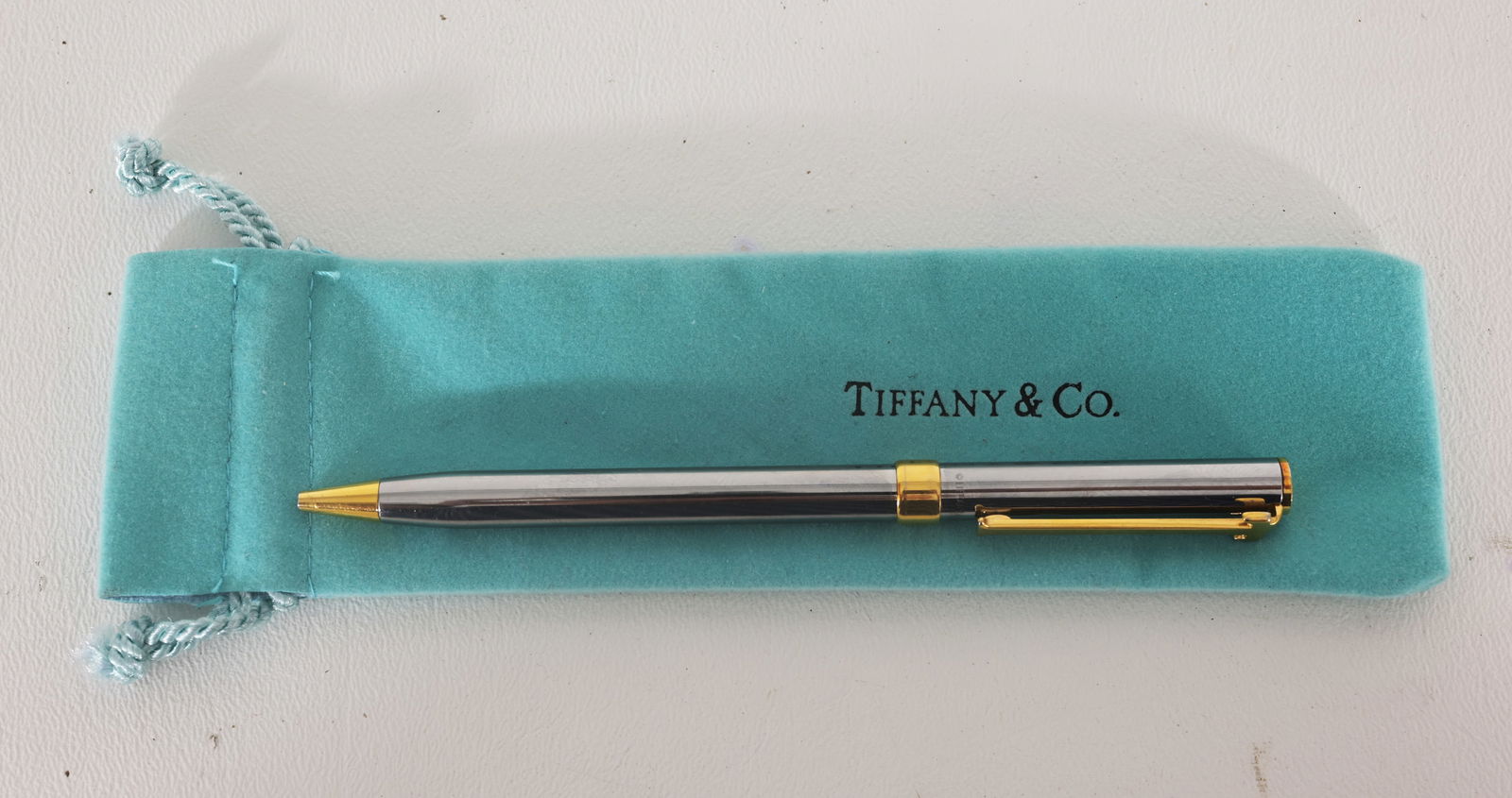 Tiffany & Co Sterling Silver T Clip Ballpoint Pen: Tiffany & Co Sterling Silver T Clip Ballpoint Pen. Comes with original Tiffany Blue Bag. Pen Length: 5 in.