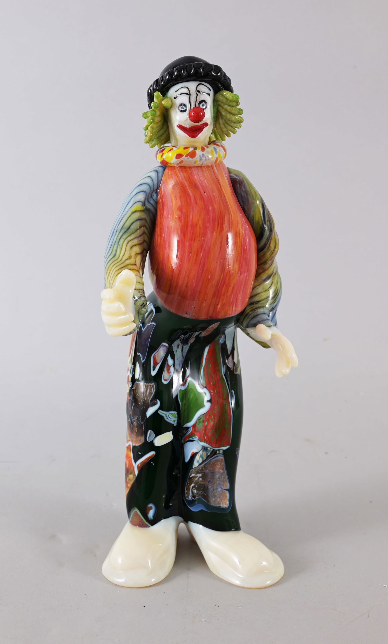 Pino Signoretto (1944 - 2017) Clown: Pino Signoretto (Italian, 1944 - 2017) Hand Blown Glass Clown. Signed near base. Dimensions: 11 x 4.25 x 4 in. Signoretto's glass clowns are some of his most famous works. Each one is unique and handc