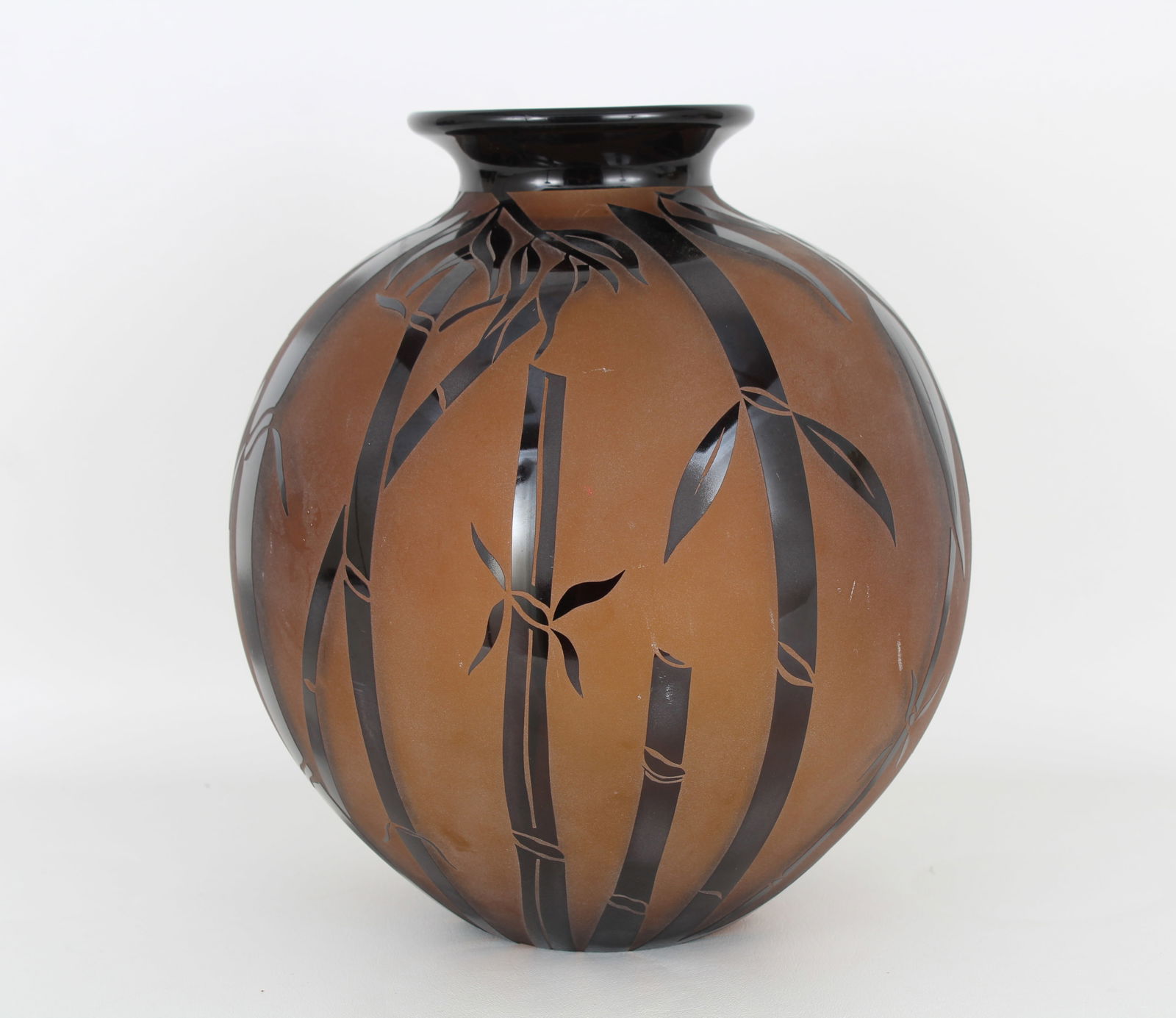 Correia Glass "Amber and Black Bamboo" Vase: Correia Glass "Amber and Black Bamboo" Vase. Signed, dated and numbered (1/500) on base. "2001 Limited Edition" Series. Size: 11 x 11 in.