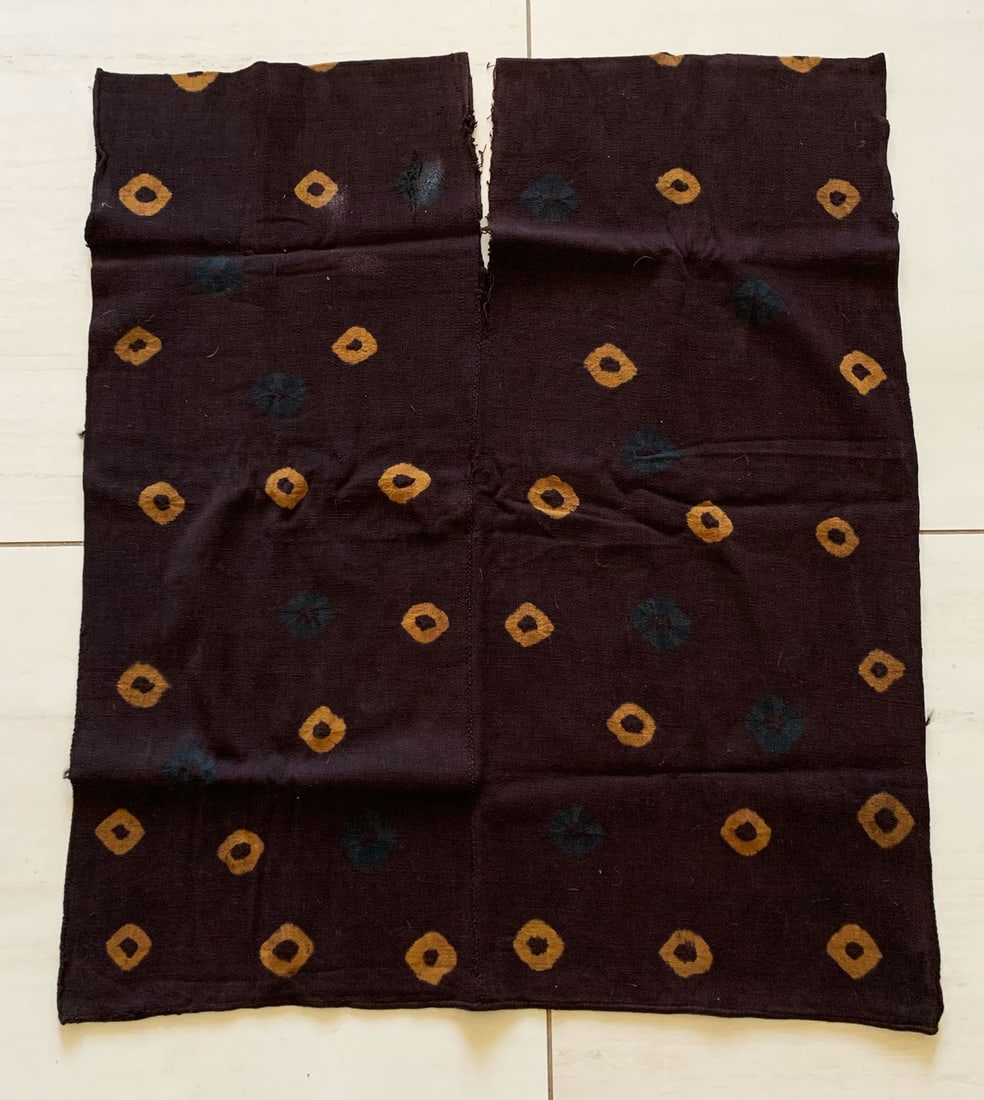 Wari Tunic - Peru: A fine Wari tunic from Peru, ca. 650 - 800 AD. This heavy textile measures 32in. x 20 in. and is decorated with simple tie-dyed circular designs. In excellent condition. Similar reference: Cf. Rowe "W