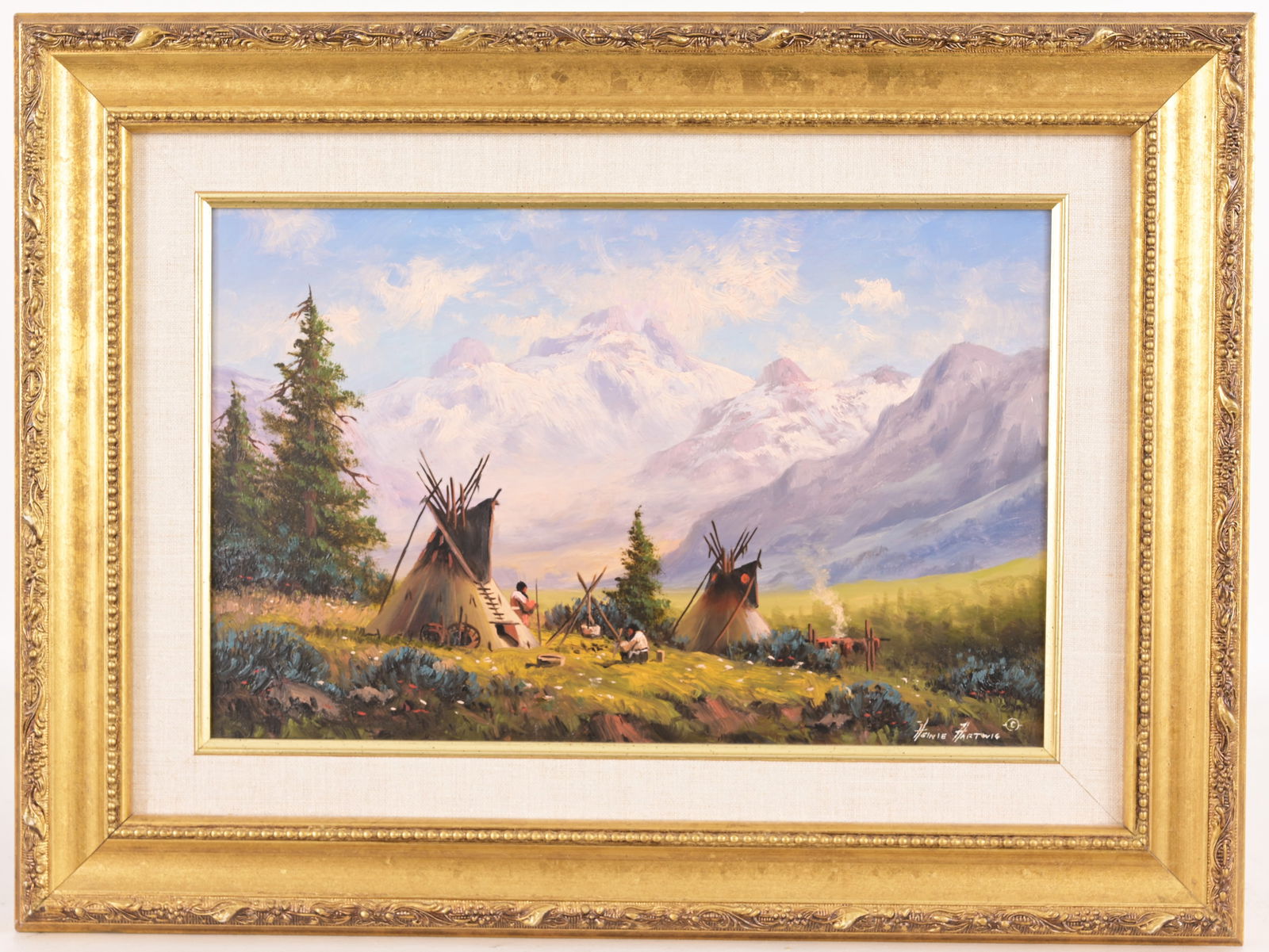 Heinie Hartwig (California, Born 1937): Heinie Hartwig (California, Born 1937) Native American Indian encampment scene with mountains in the distance. Oil on canvas. Signed lower right. Housed in the original frame. Label with artist biogra