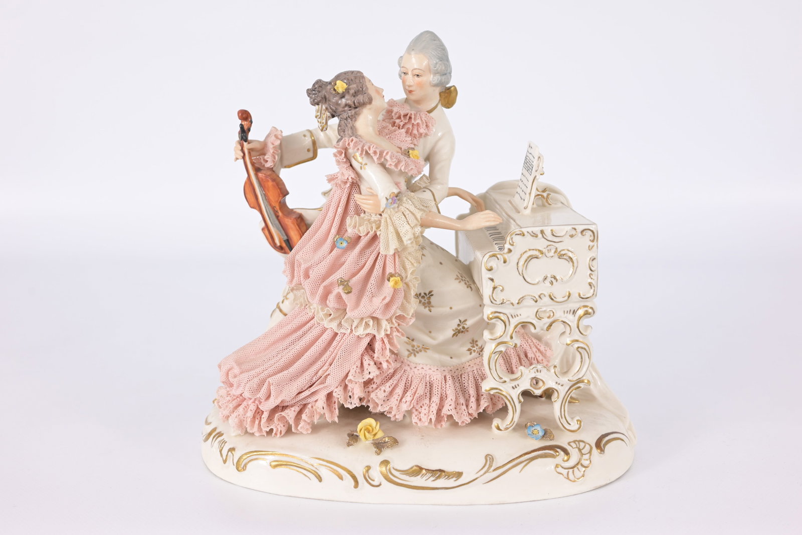 Antique Dresden Porcelain Figural Musical Scene: Antique Dresden Porcelain Figural Musical Scene. Marked near bottom of the grouping. Height: 8.25 in.