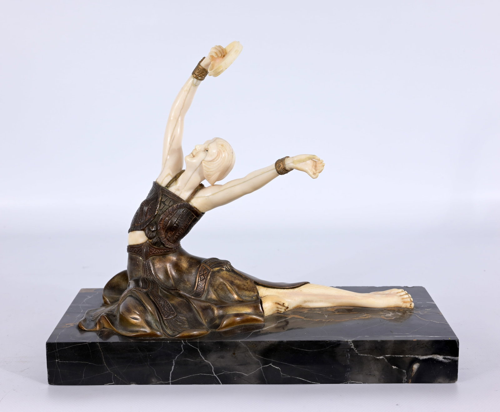 Samuel Lipchytz (Lipszyc) (1880 - 1943): Samuel Lipchytz (Lipszyc) (1880 - 1943) Dancer with tambourine Chryselephantine figure made of patinated (or cold-painted) bronze. Signed on back of dress. Dimensions: 10.75 x 13 x 5.75 in. A charming