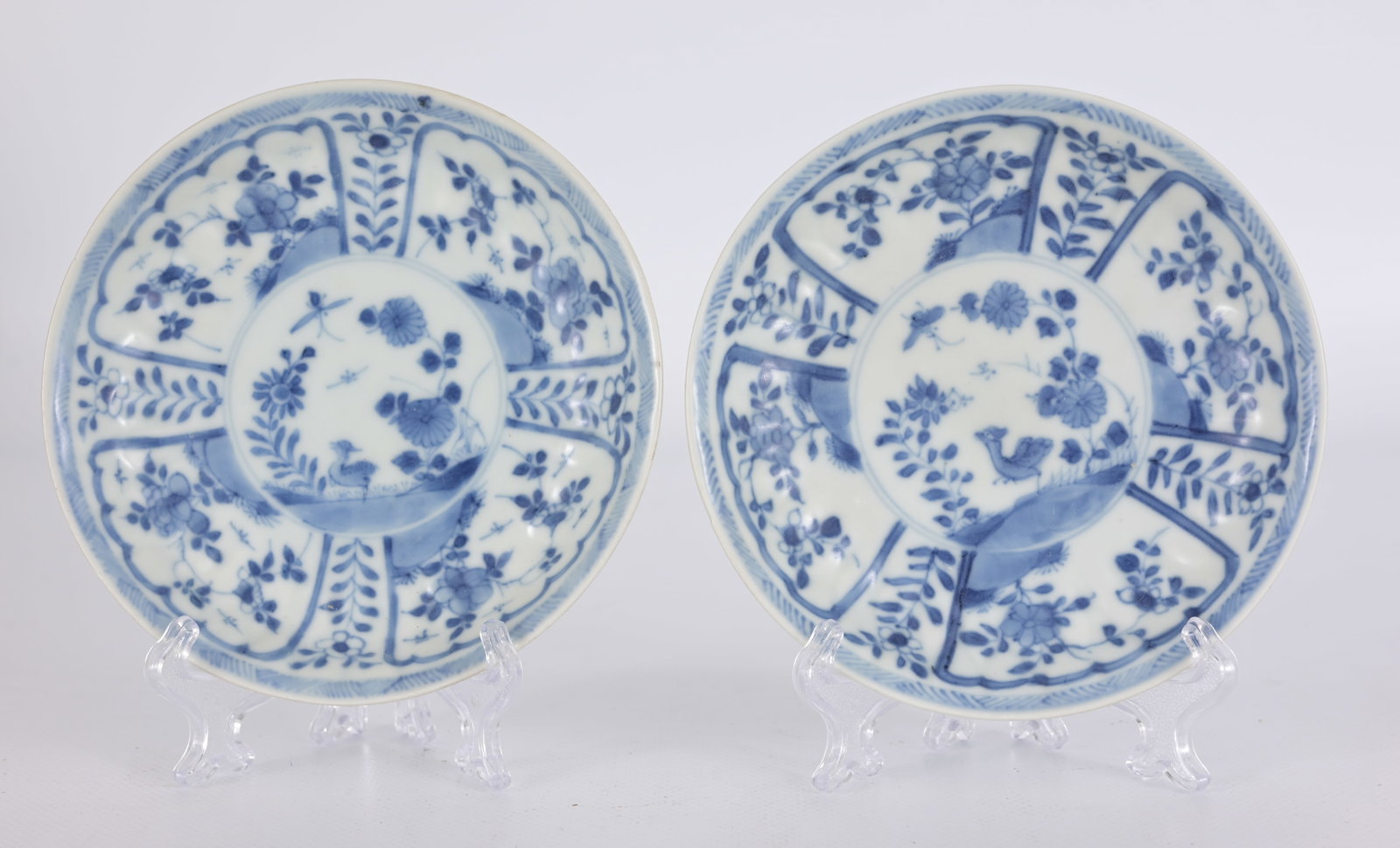 Antique Chinese Blue and White Porcelain Saucers: Antique Chinese blue and white porcelain export saucers in the traditional Kraak ware format. Diameter: 4.5 in.