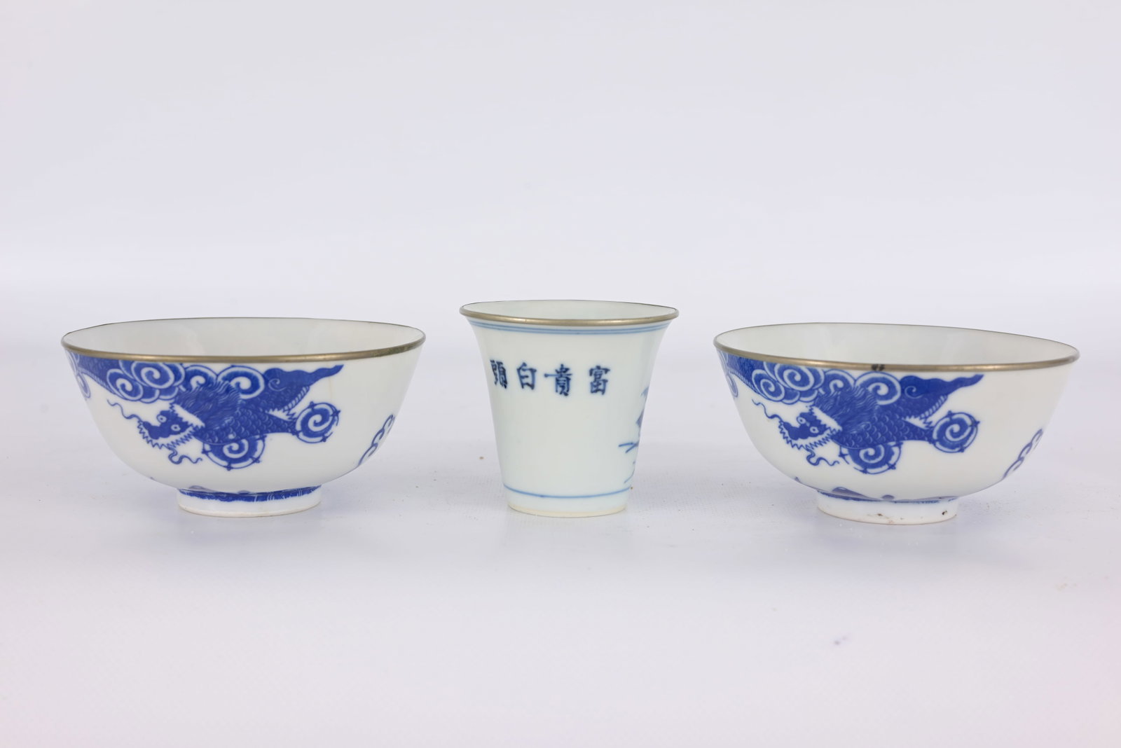 (3) Chinese Bleu de Hue Porcelain Vessels: (3) Bleu de Hue Porcelain Pieces which are specialized export wares. They were ordered from the famous kilns of Jingdezhen, China, specifically for the Vietnamese Imperial Court and elite market durin