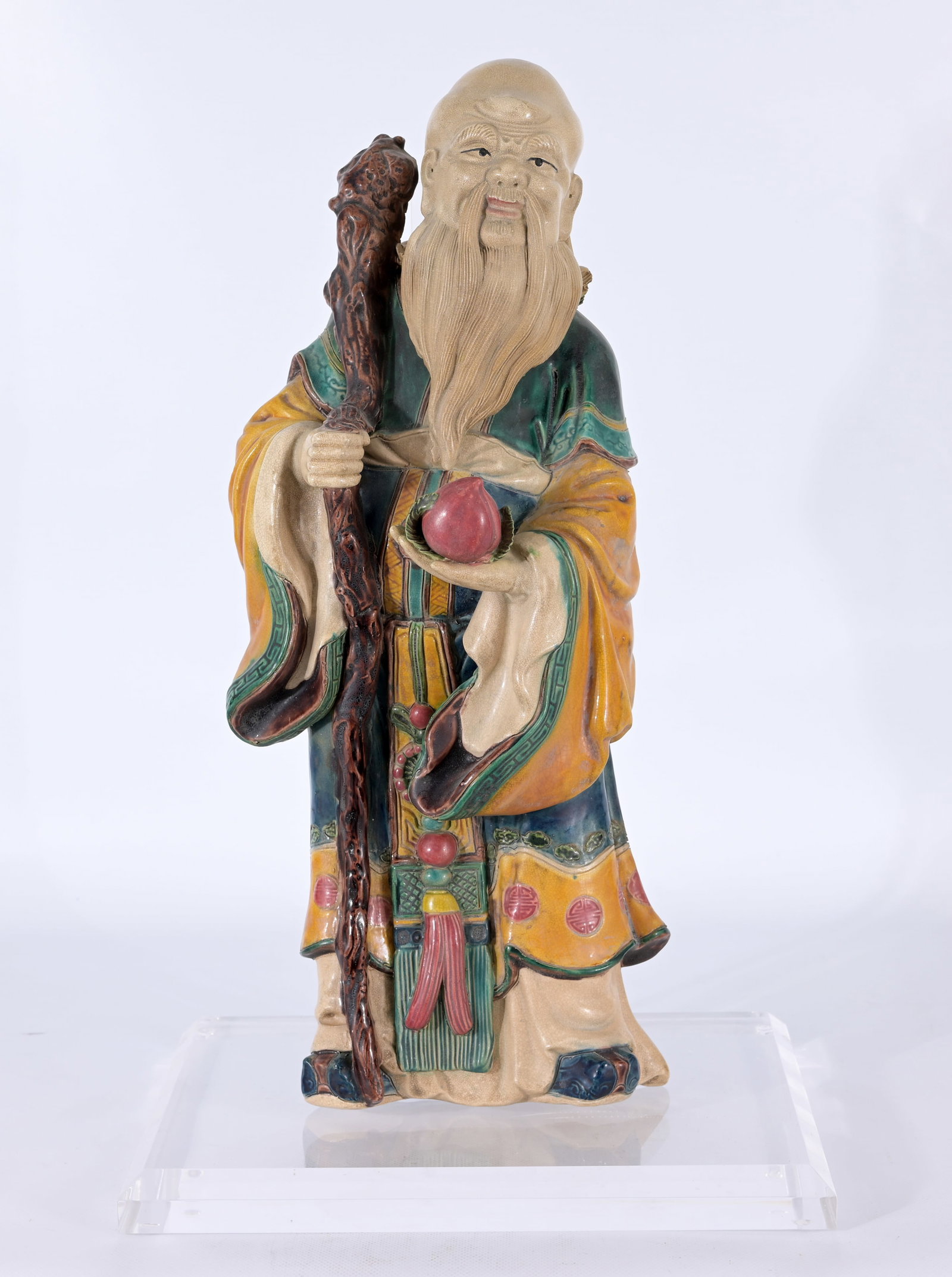 Chinese Pottery Figure of Shouxing (Shou Lao): Chinese Pottery Figure of Shouxing (Shou Lao) the Daoist God of Longevity. He is one of the three popular stellar deities known collectively as the Sanxing (Fu, Lu, and Shou), who represent Fortune, P