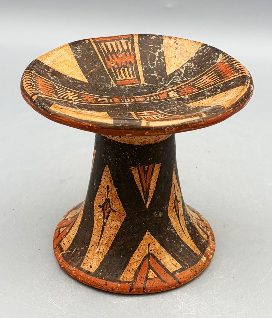 Cocle polychrome frutero pedestal plate - Panama: A lovely Cocle polychrome frutero pedestal plate from Panama, ca. 1000-1300 AD. This lovely Parita style example is 4-1/8 in. in diameter, 3-3/4 in. high and is decorated with stylized designs